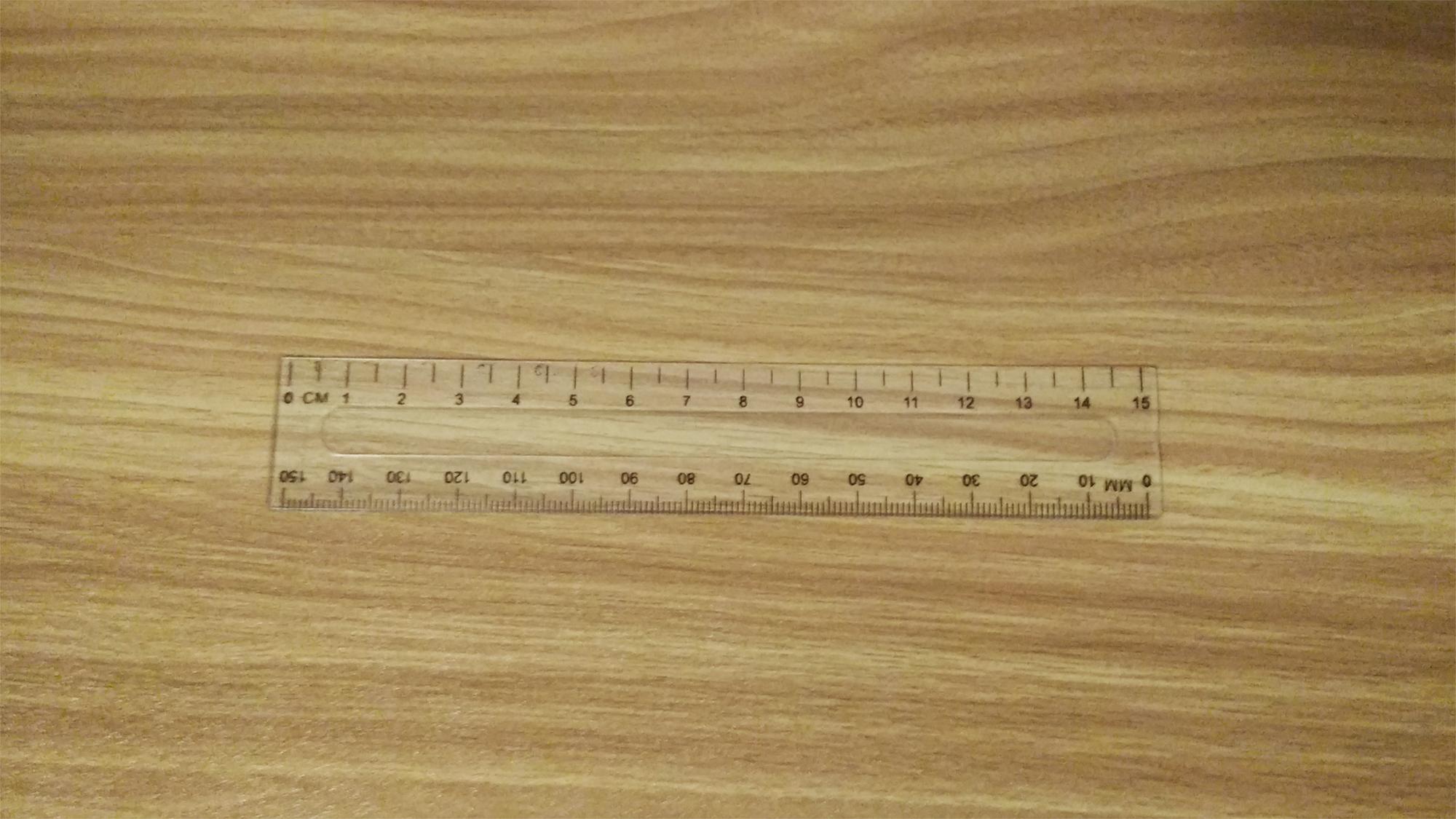 The pattern on my friends ruler blends in with the pattern on his 2015