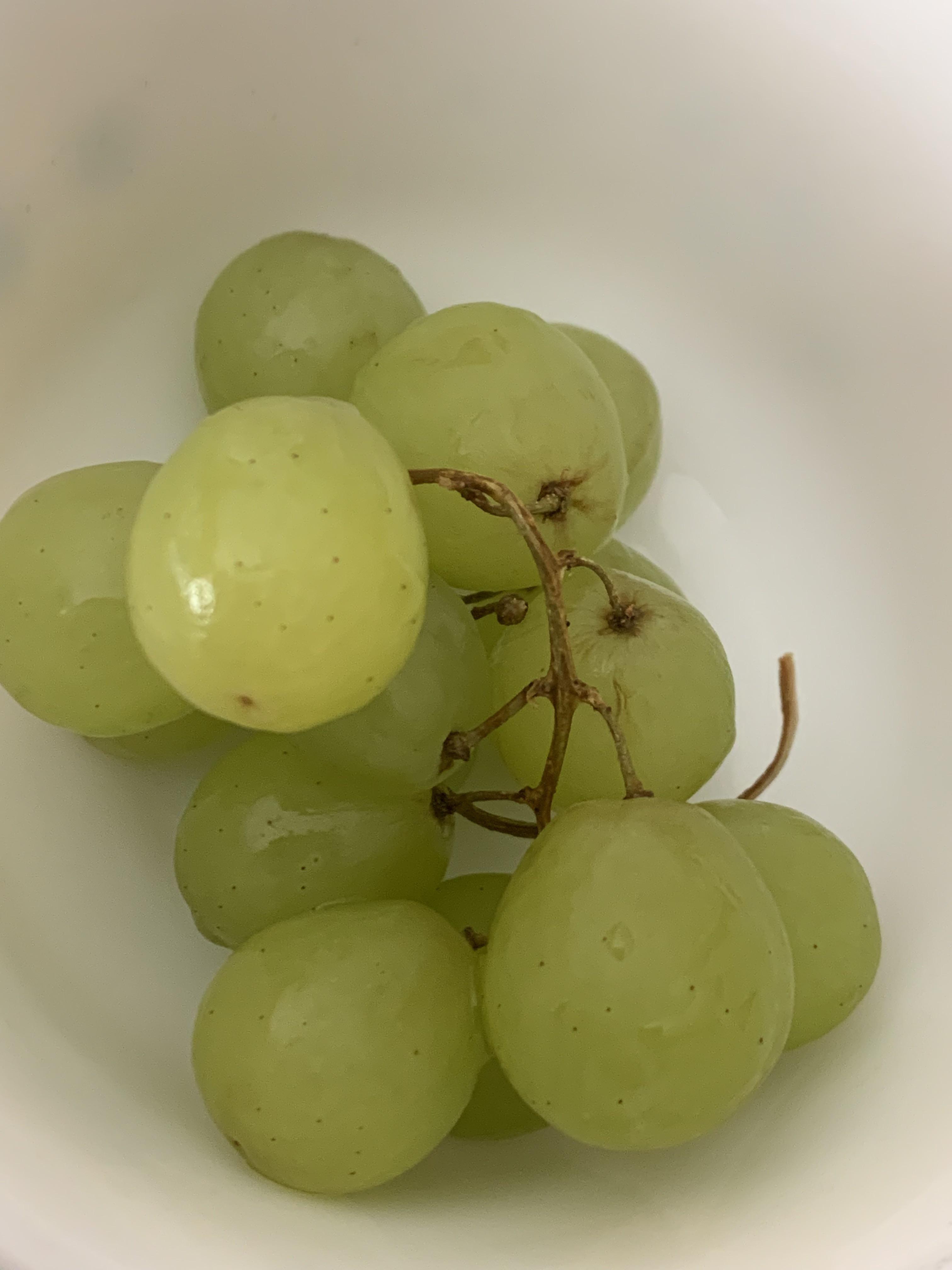 Hi! What are these brown dots on grapes? Is it part of the ripening