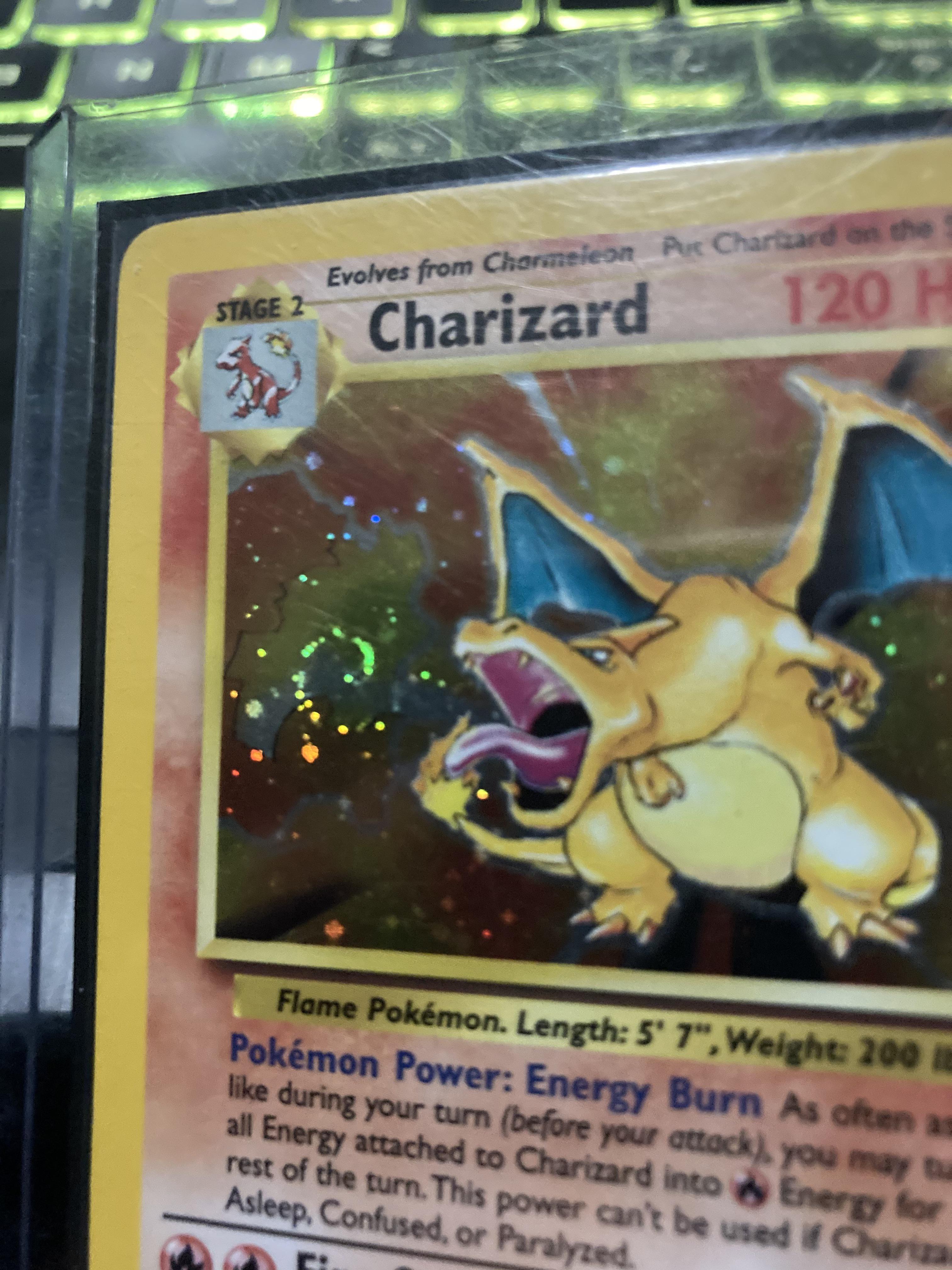 Always loved how my Base 2 Charizard had a holo swirl right where the fire is. Cosmos holos are