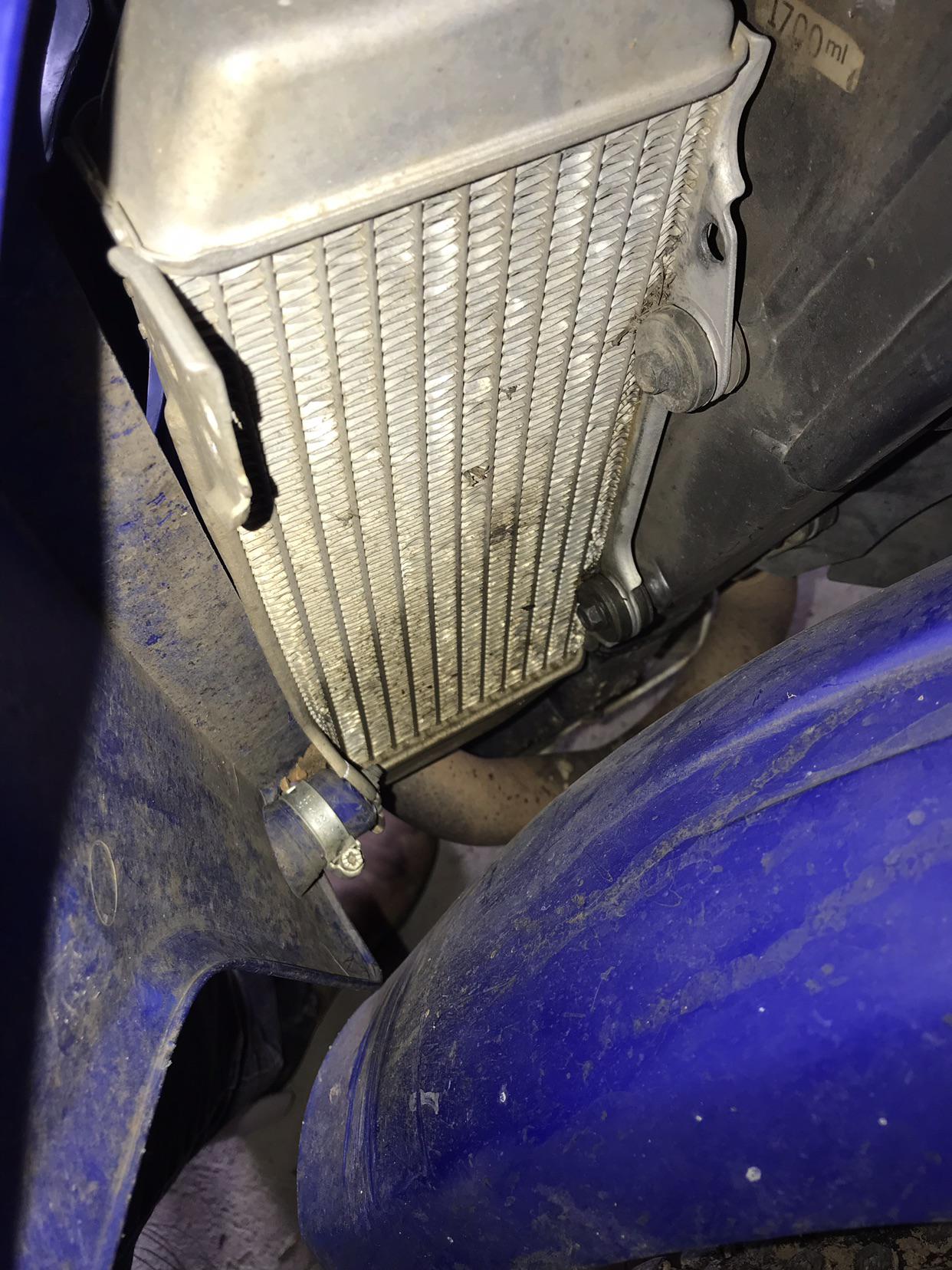 I bent my radiator and I wanted to know what I needed to do to fix it