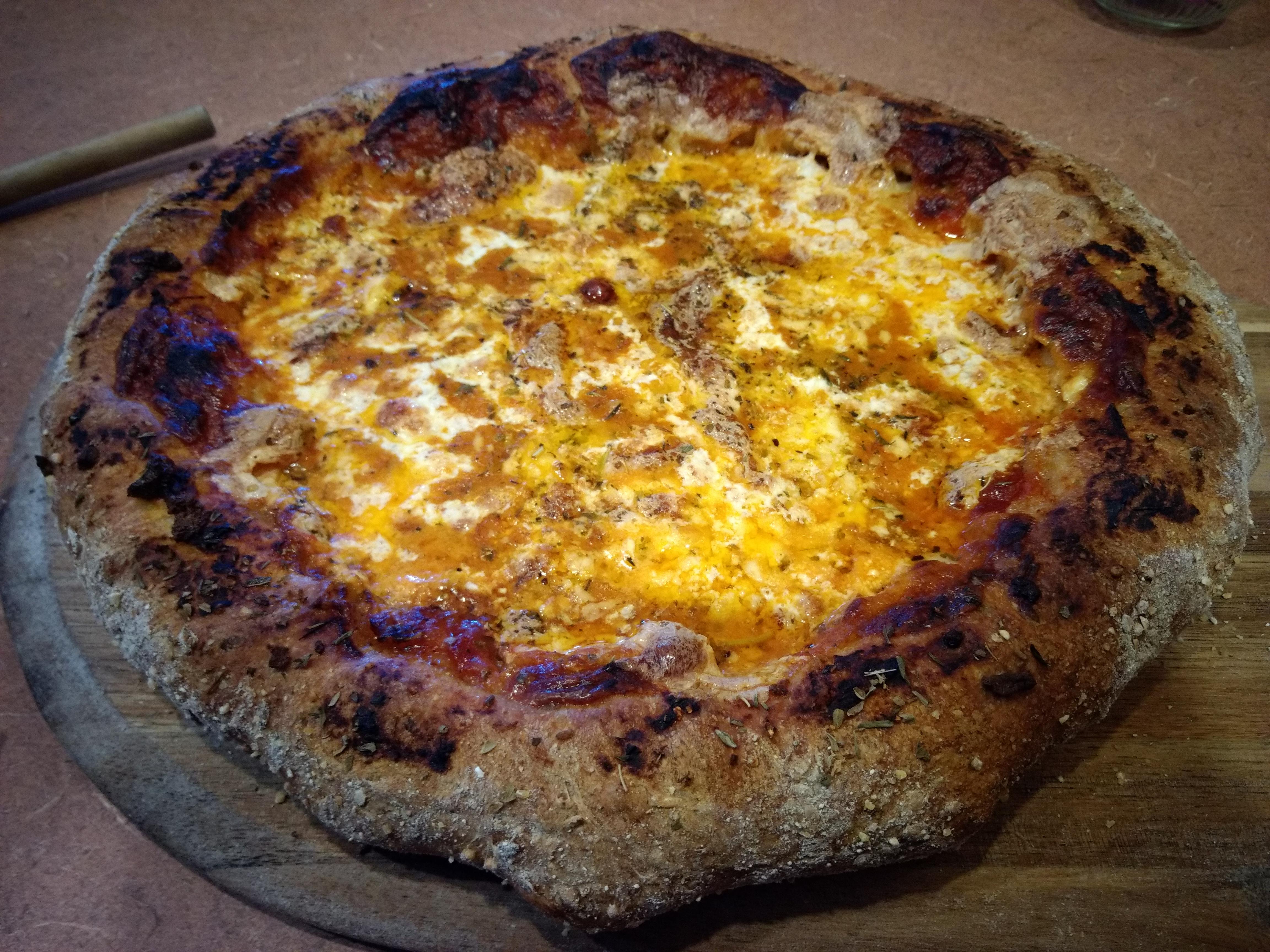 [OC] I made a stuffedcrust pizza with sharp provolone, goat cheese