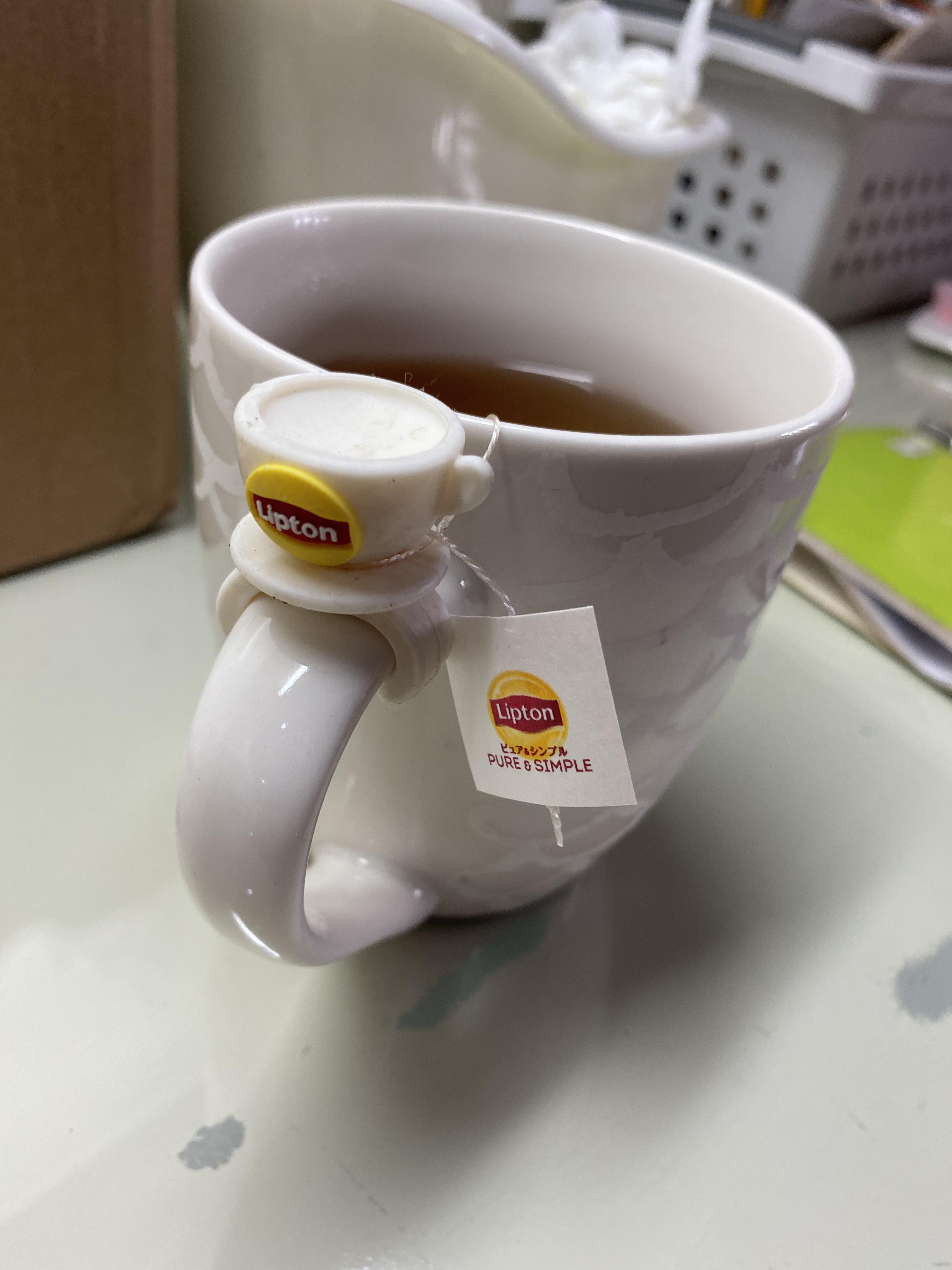 My Lipton tea came with a teacup shaped teabag holder r/mildlyinteresting