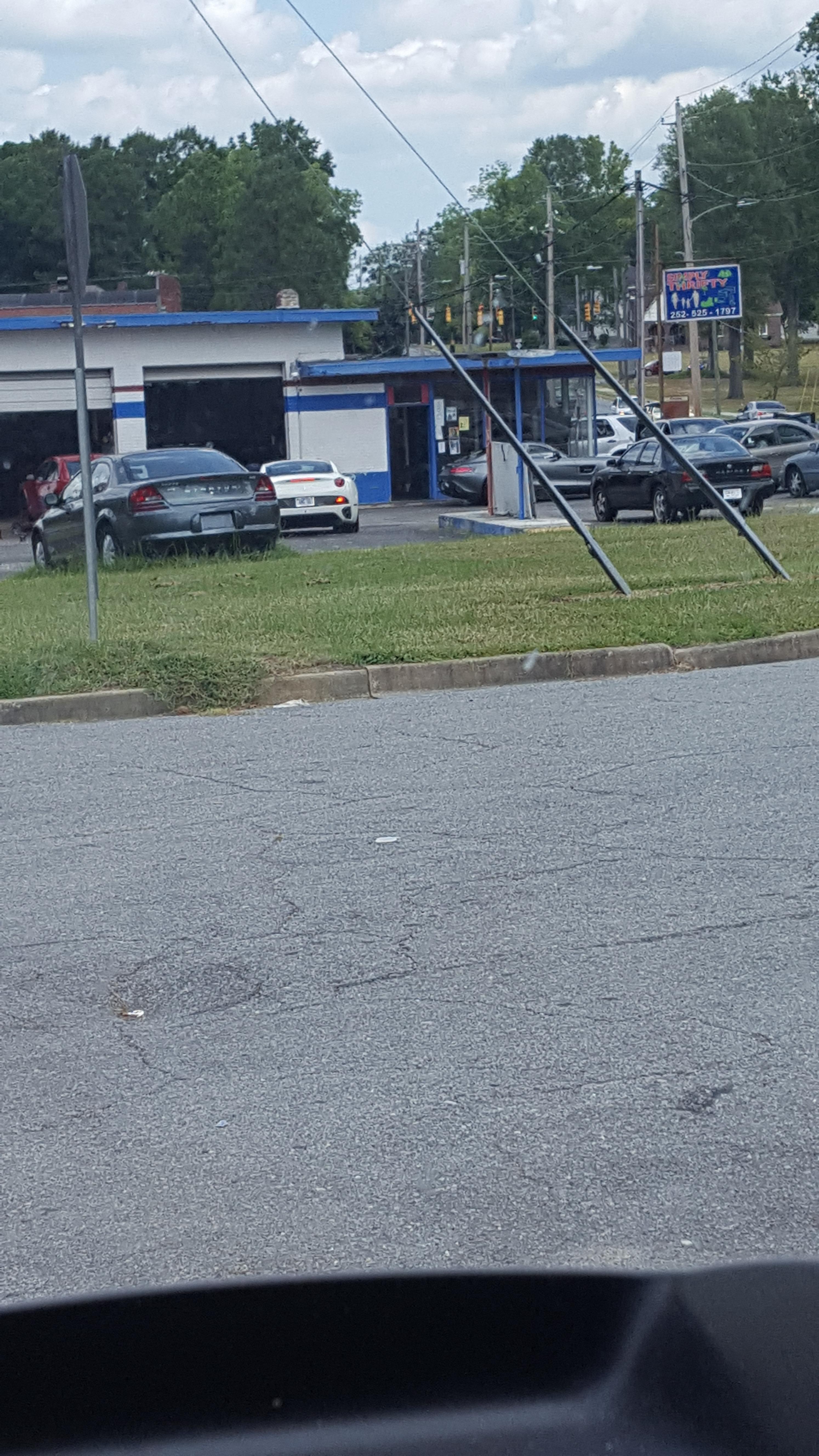 2 amazing cars at a shady shop *you can bearly see the GTS in the back