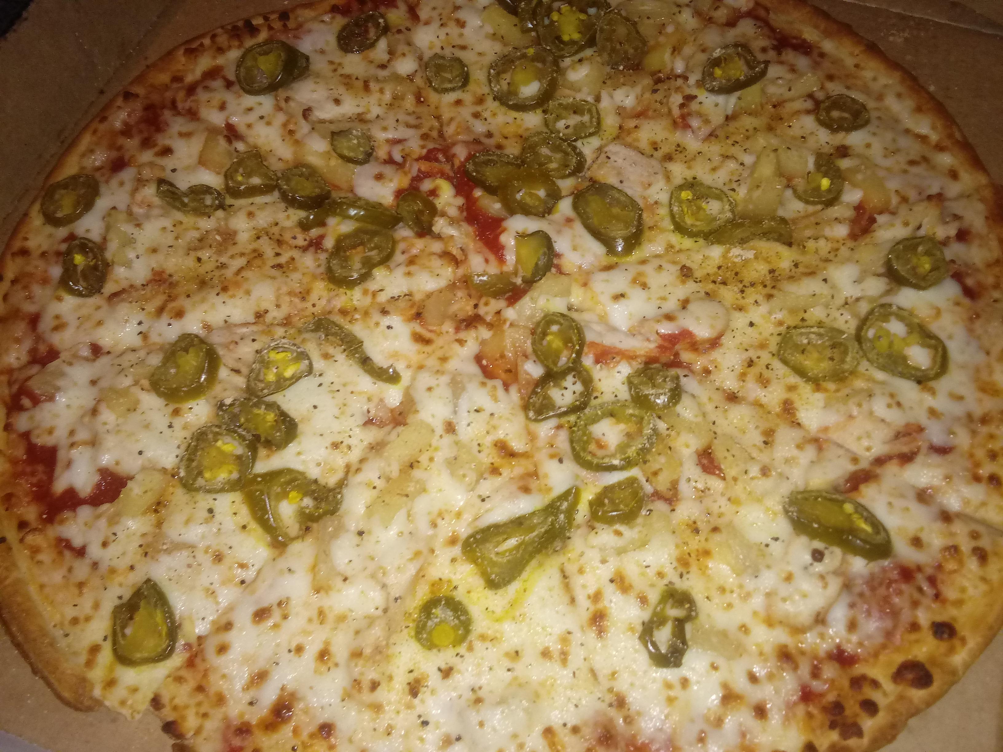 I work at Papa Johns, so I got me a Pineapple, Chicken, and Jalapeño pizza