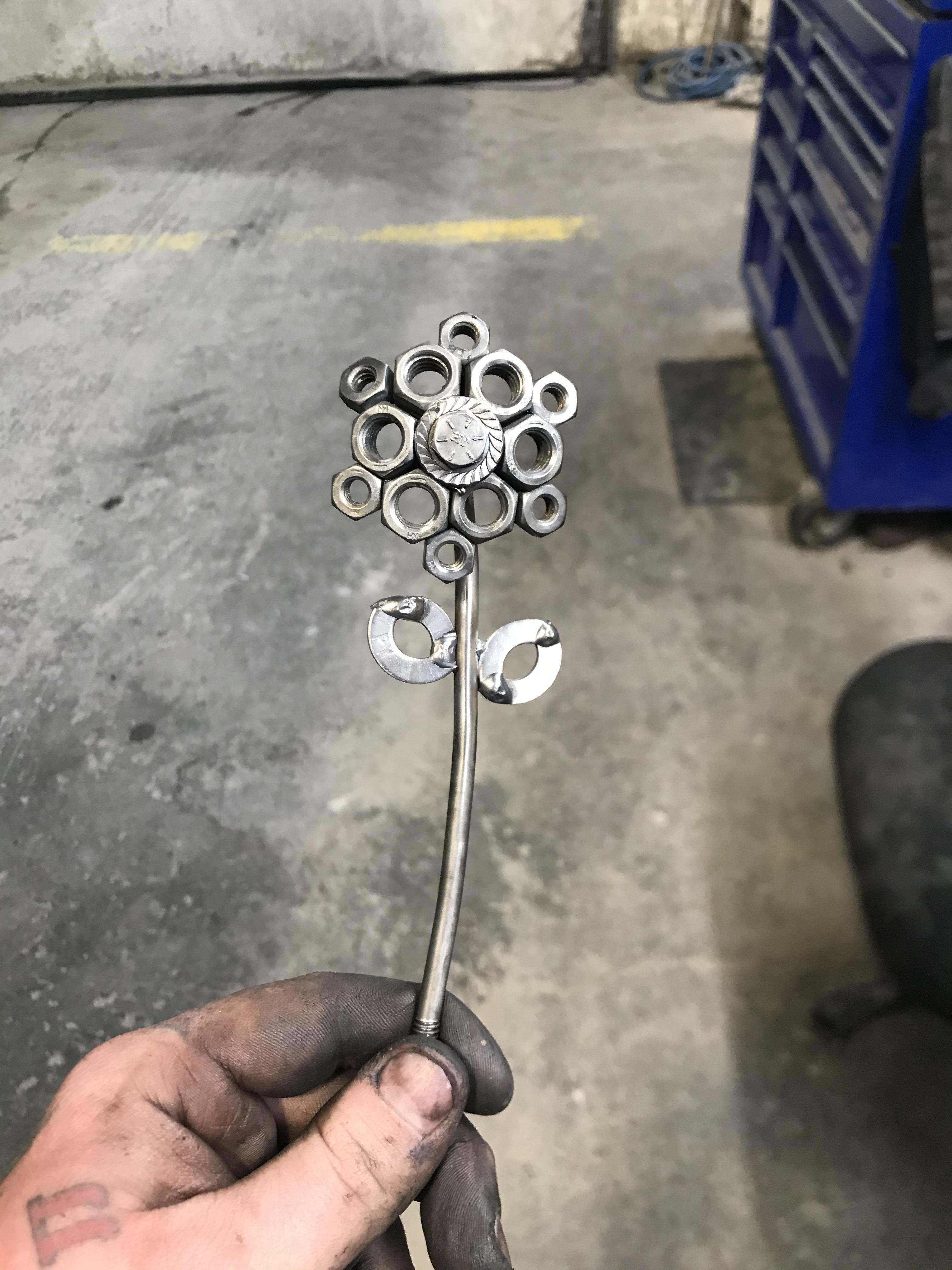 A flower out of nuts and bolts for my grandma. r/somethingimade
