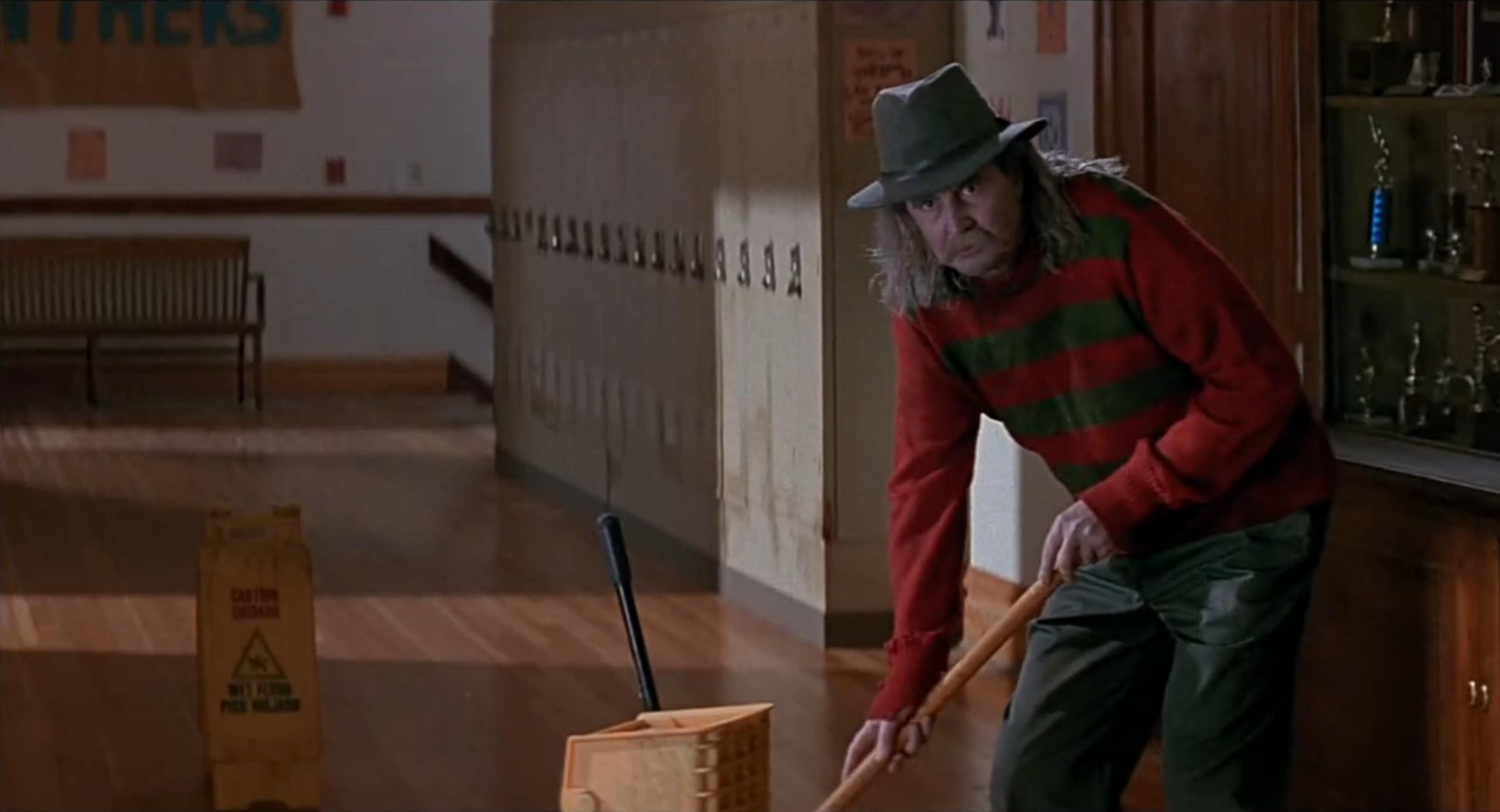 Wes as Fred the janitor in Scream NightmareOnElmStreet