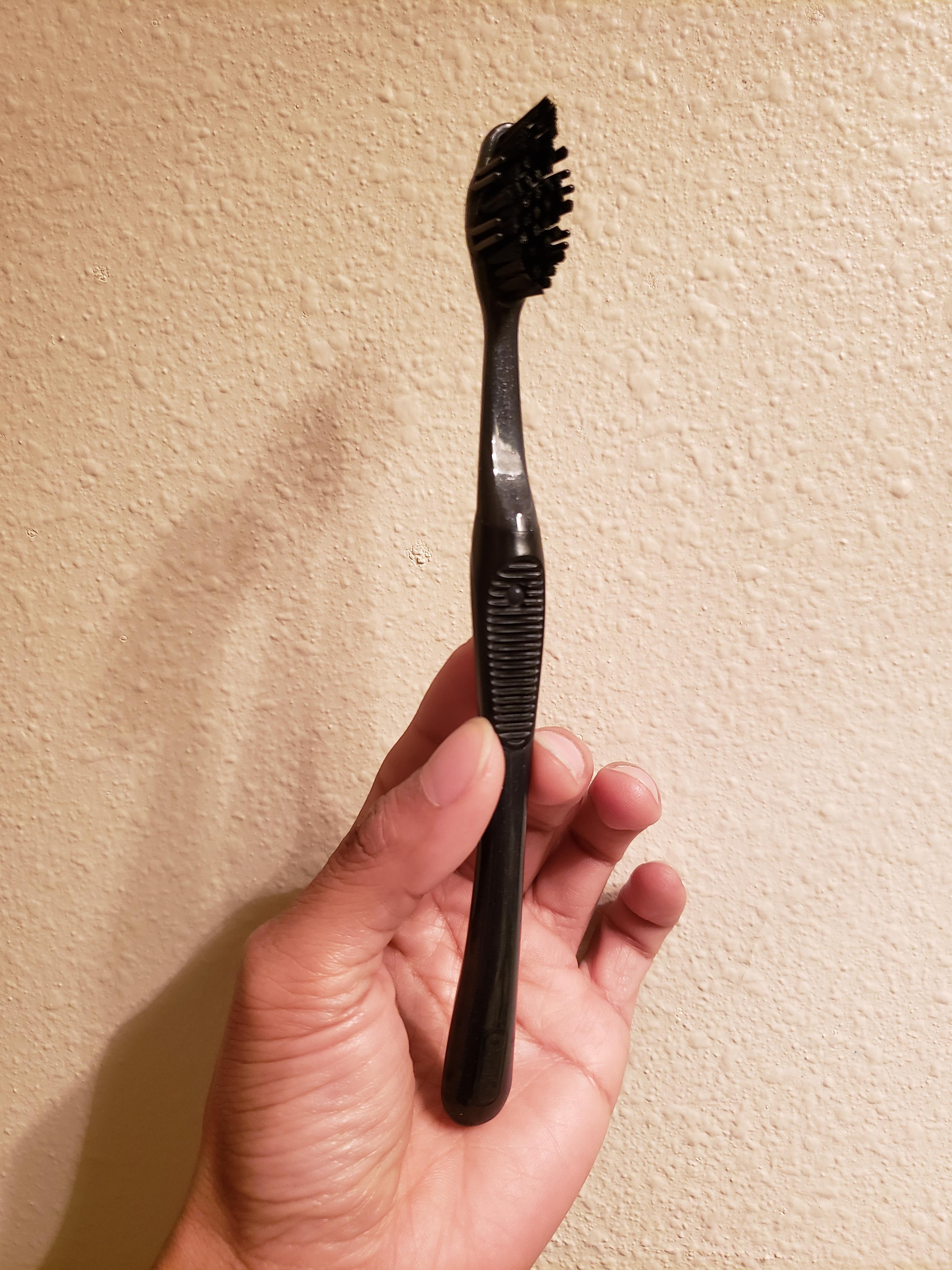 All black toothbrush with charcoal infused bristles r/mildlyinteresting