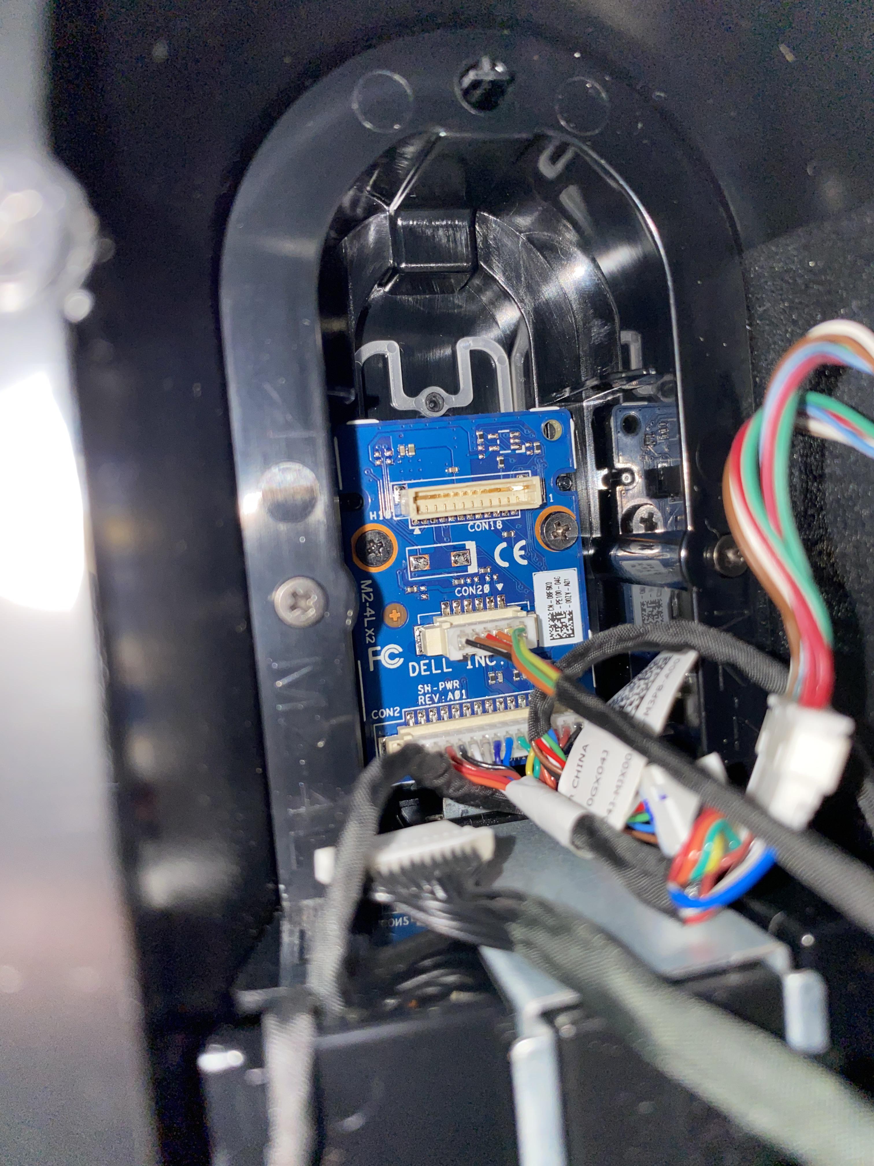 This is the chip behind the power button on the front bezel of an