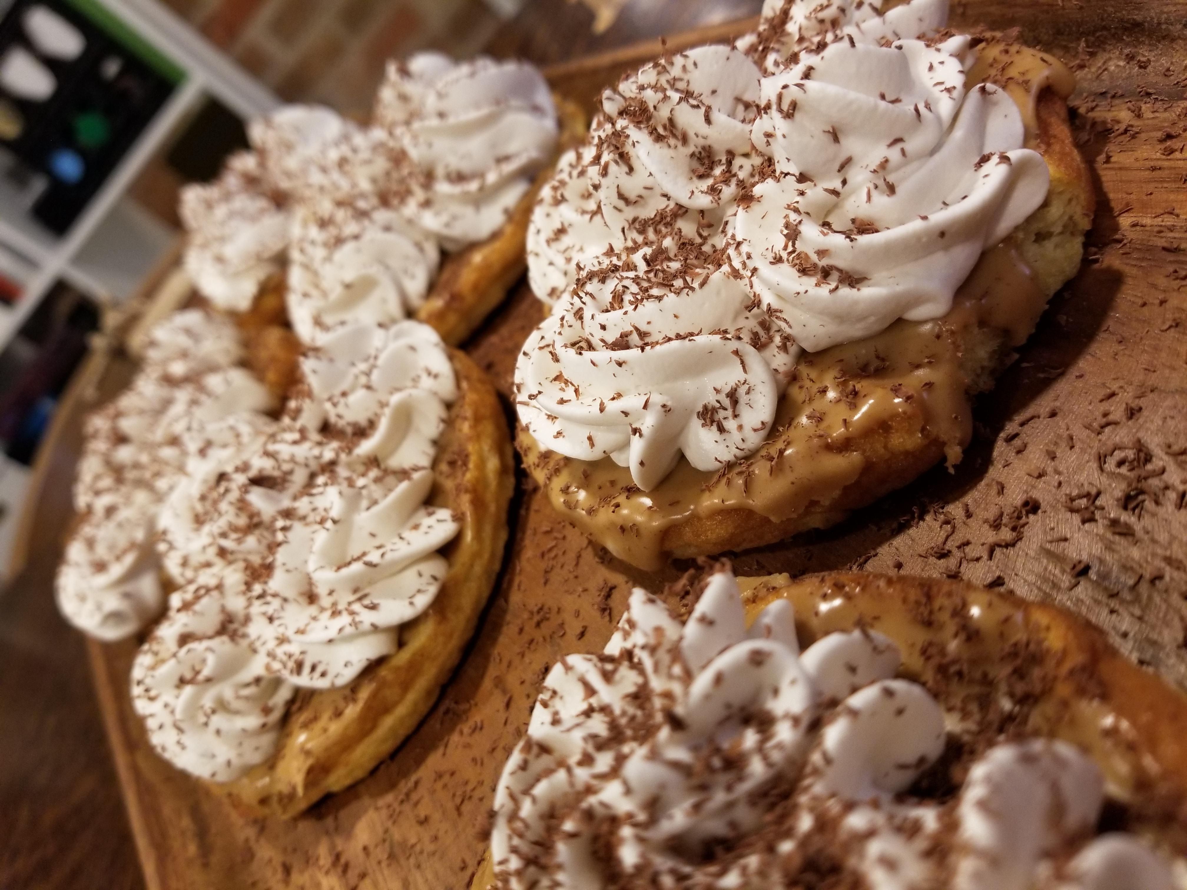 Keto waffle with peanut butter whipped cream and 100 dark chocolate