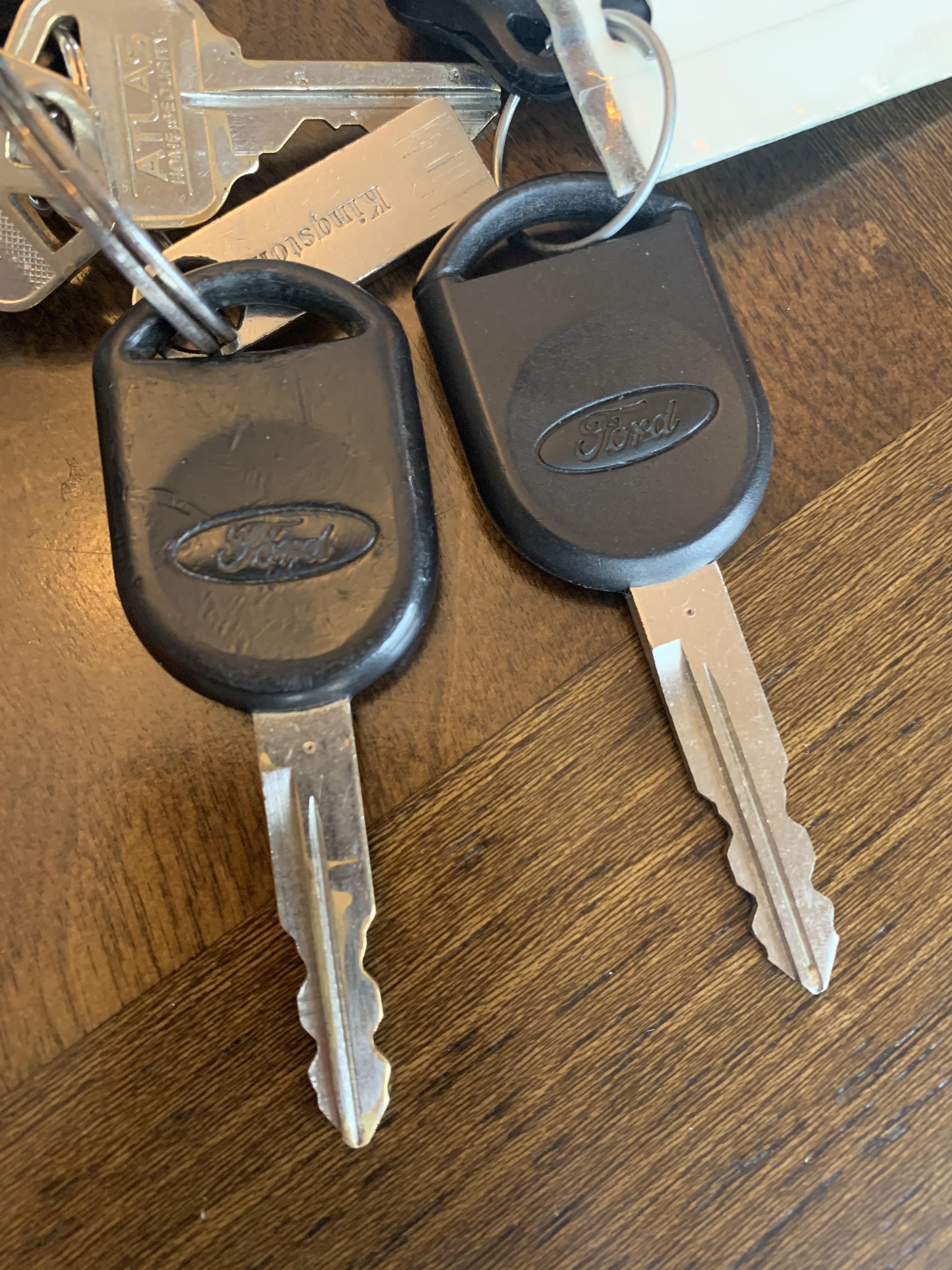 Car key I’ve used almost daily since 2013 versus the spare, seldom used