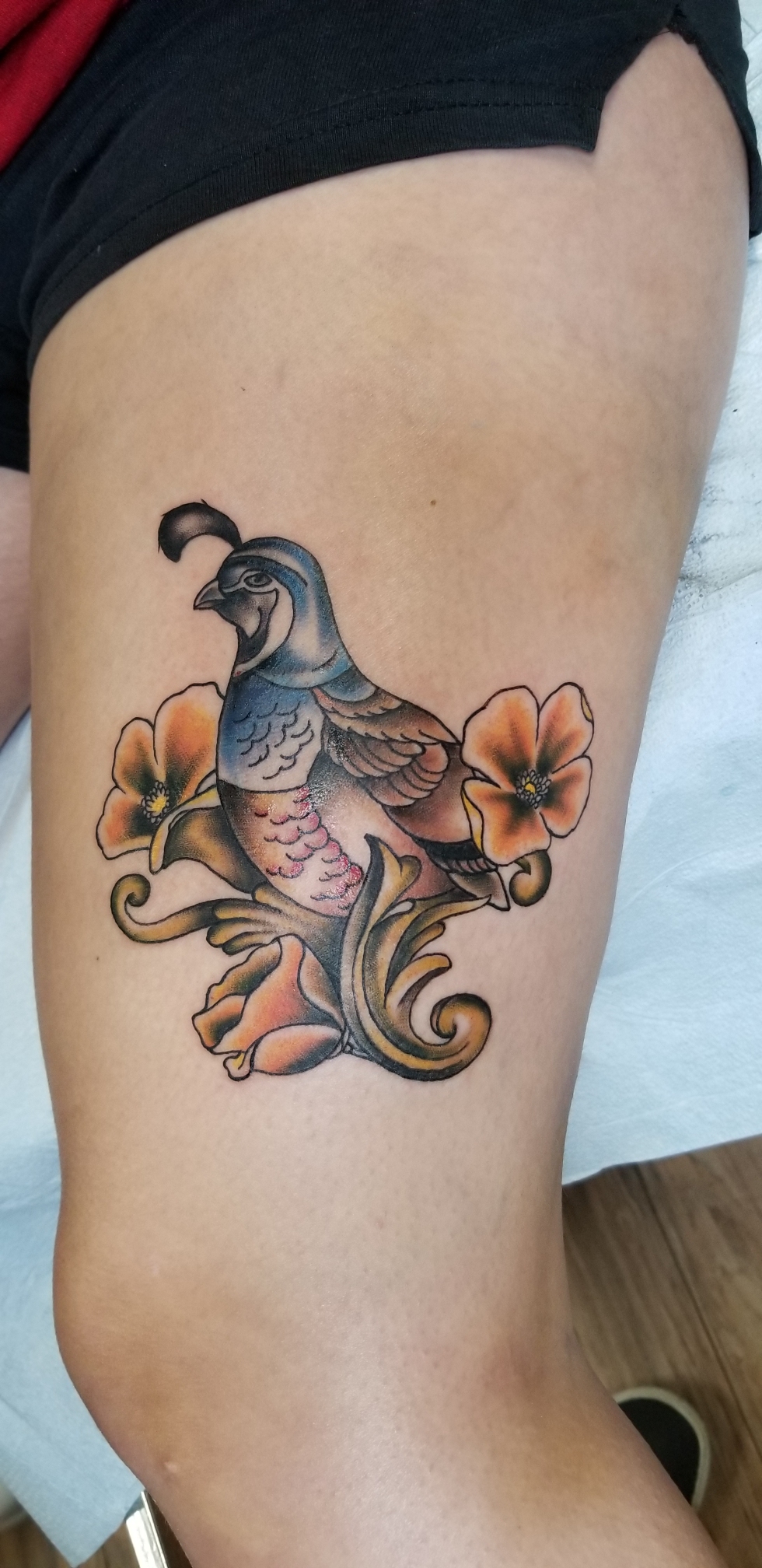 Quail and poppies done by Wooddy at Brickhouse Tattoo in Fresno, CA