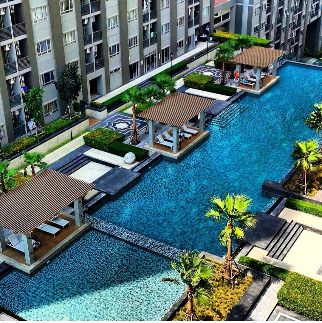 An affordable "Thai Pad" 25metre luxury swimming pool, bachelor condo