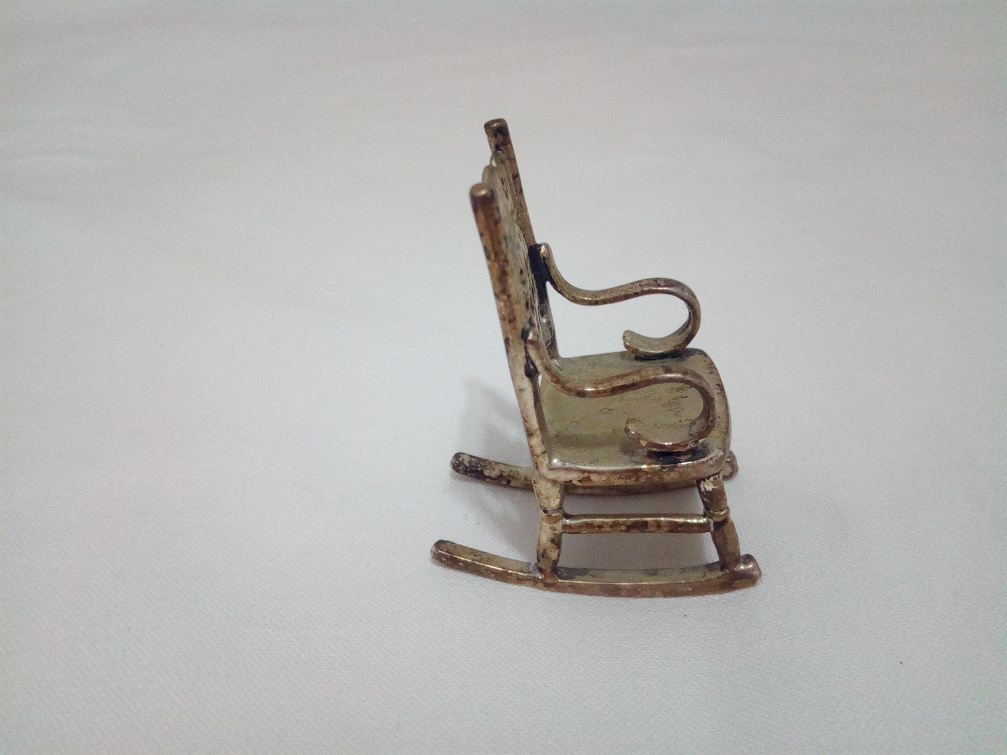 I found this tiny chair, it was on a jewelry box of my grandmother