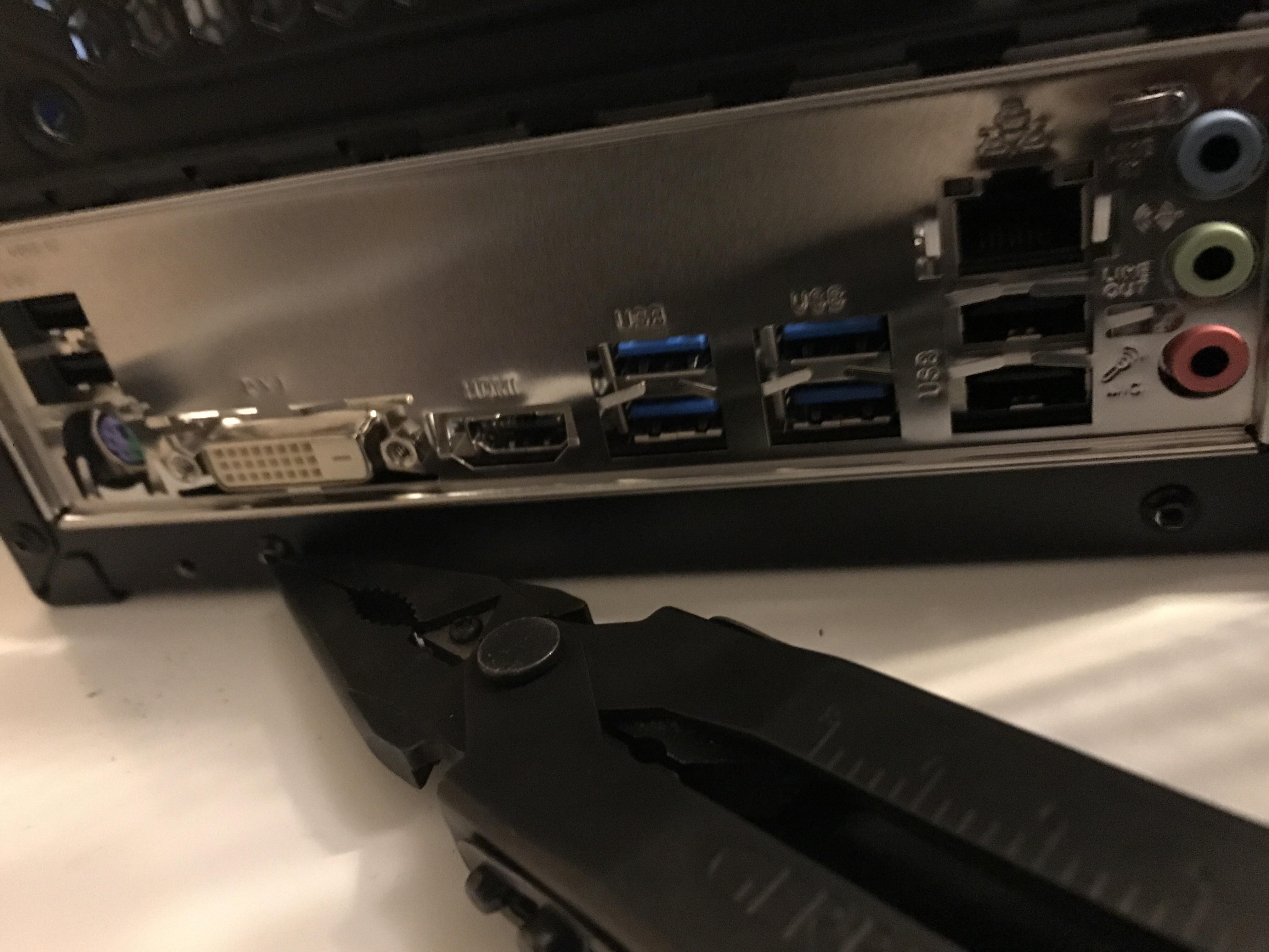 How does one install mobo into io shield correctly r/pcmasterrace