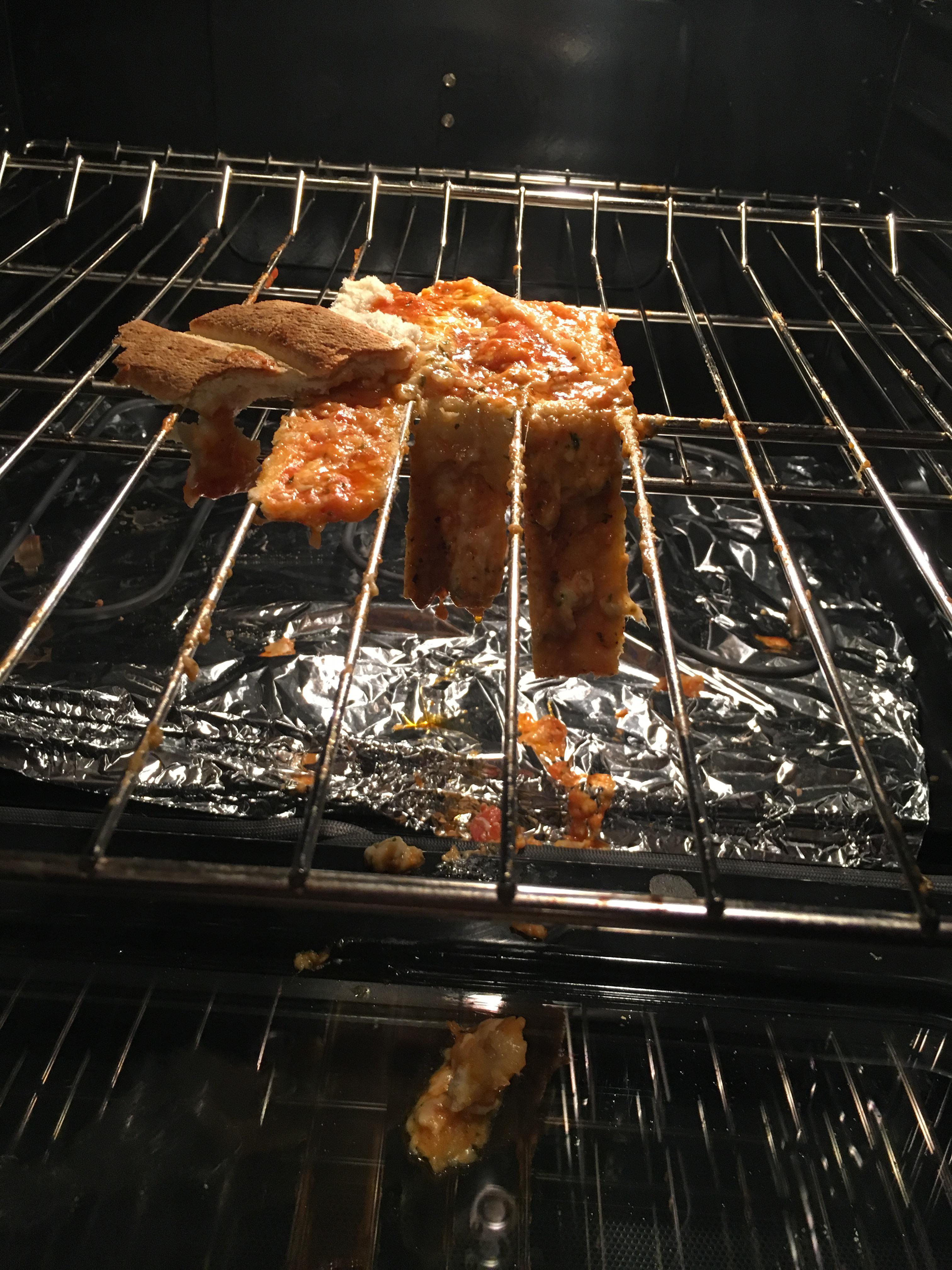 Cooked a frozen pizza for my parents at their apartment. It stuck to