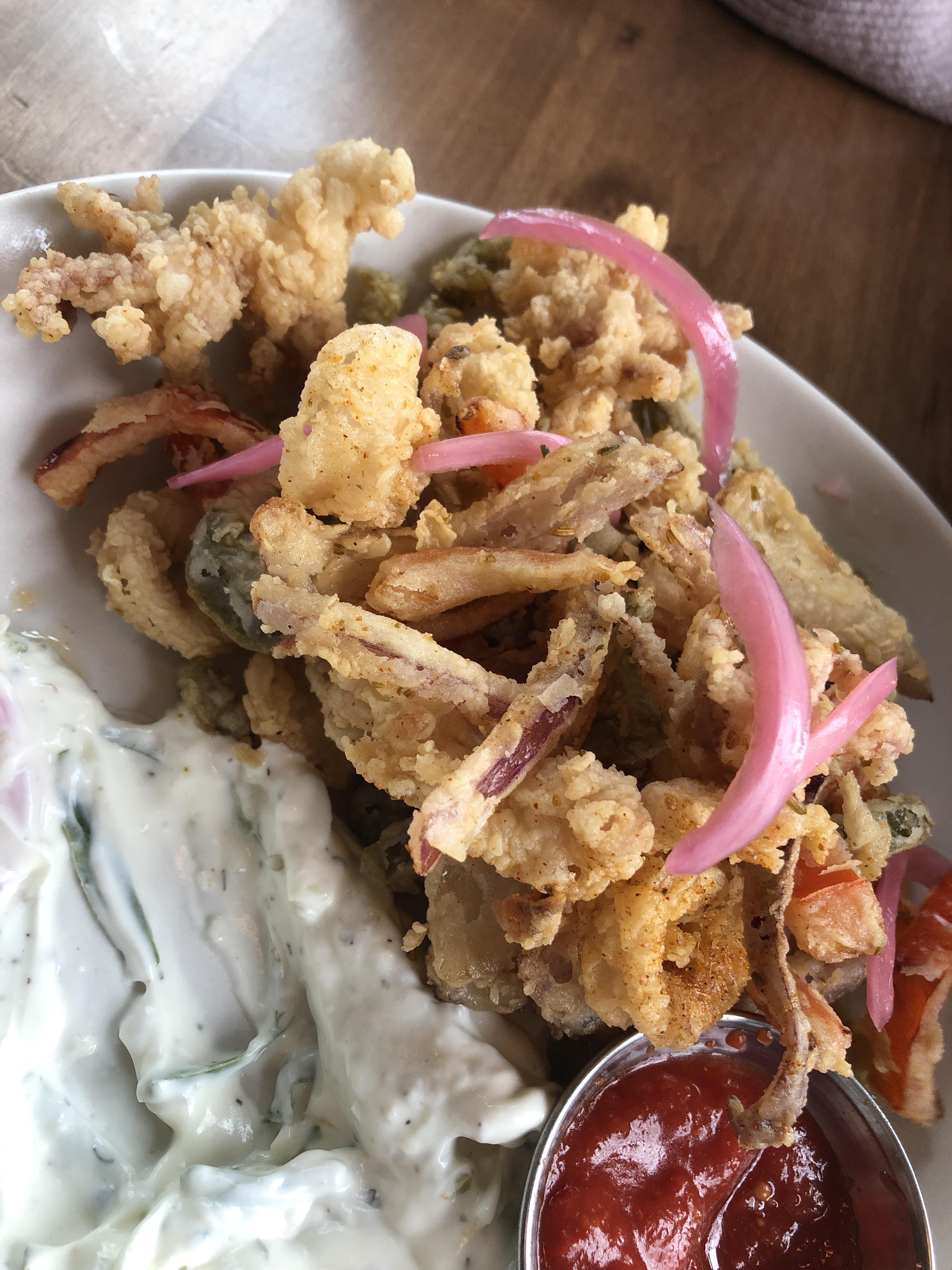 Deep fried red onions in our calamari D r/OnionLovers