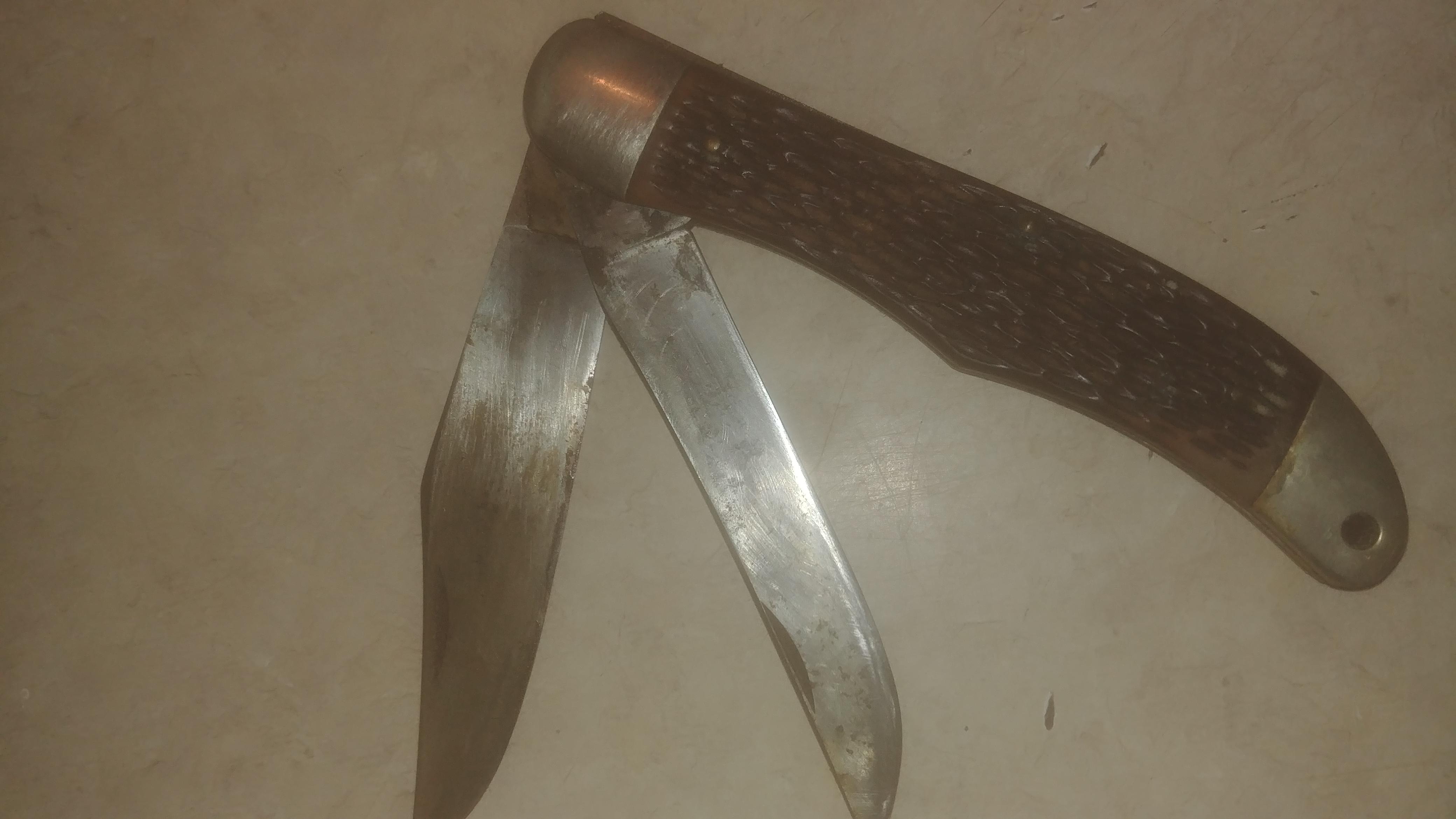 I got this knife at a yard sale in a tool box covered in grease, what's the best way to get the
