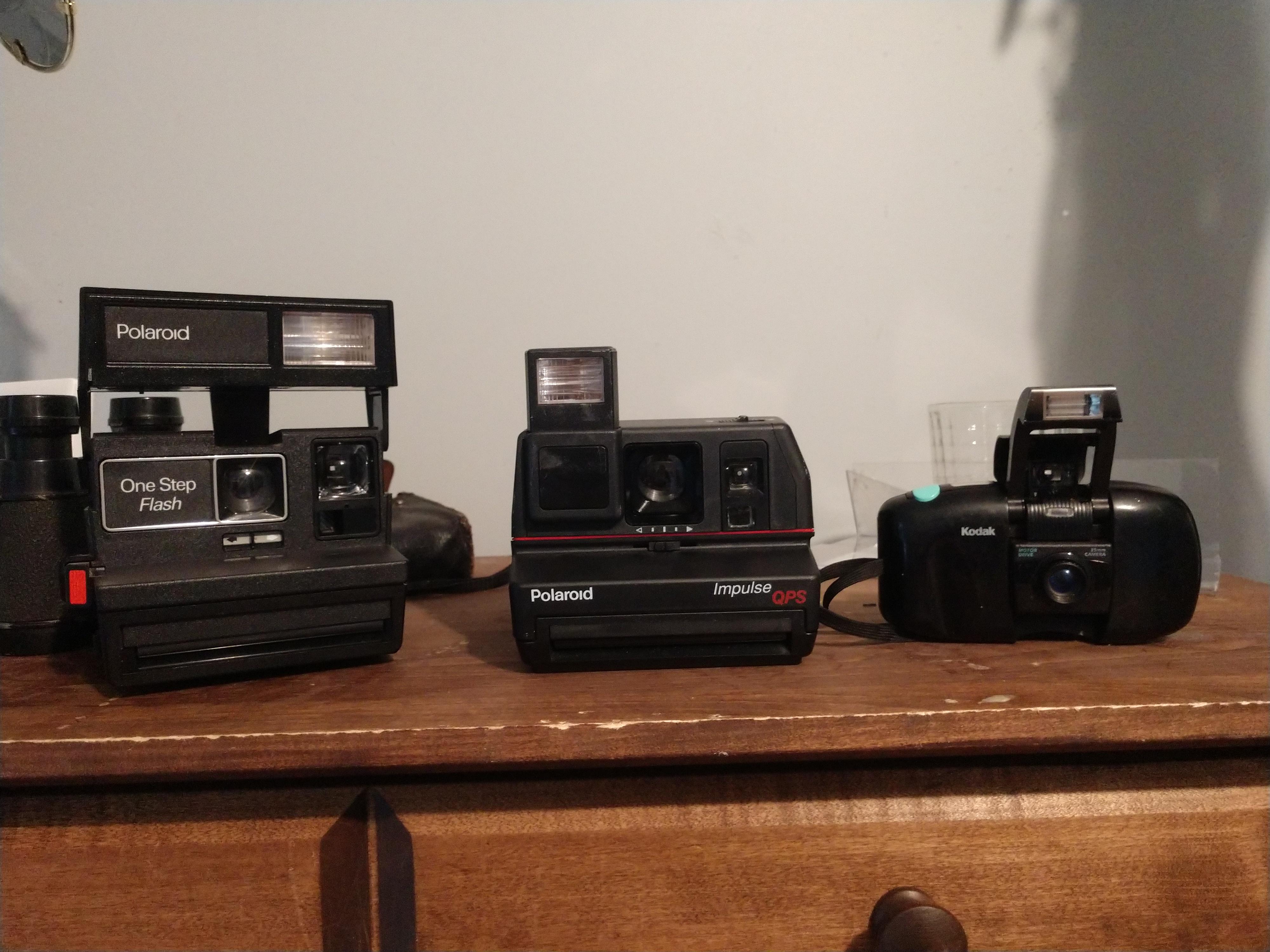 Got these at a thrift store for 15, film and all. r/Cameras