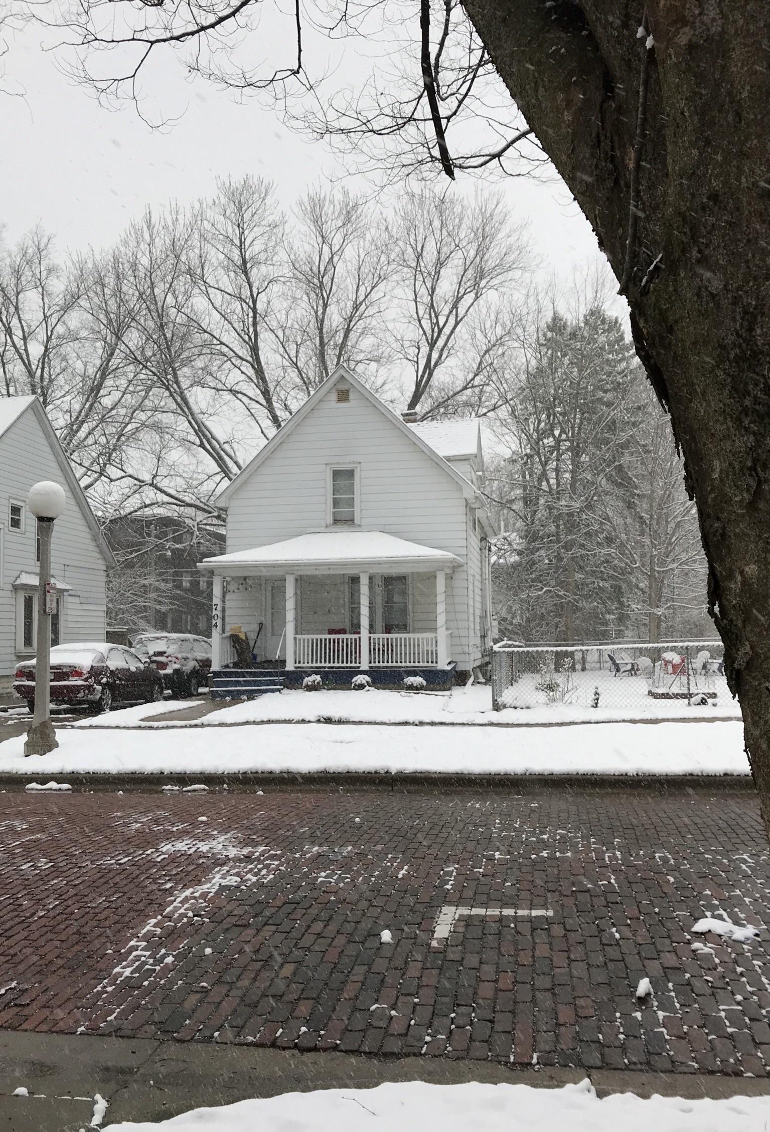 American Football house covered in some early spring snow April 1