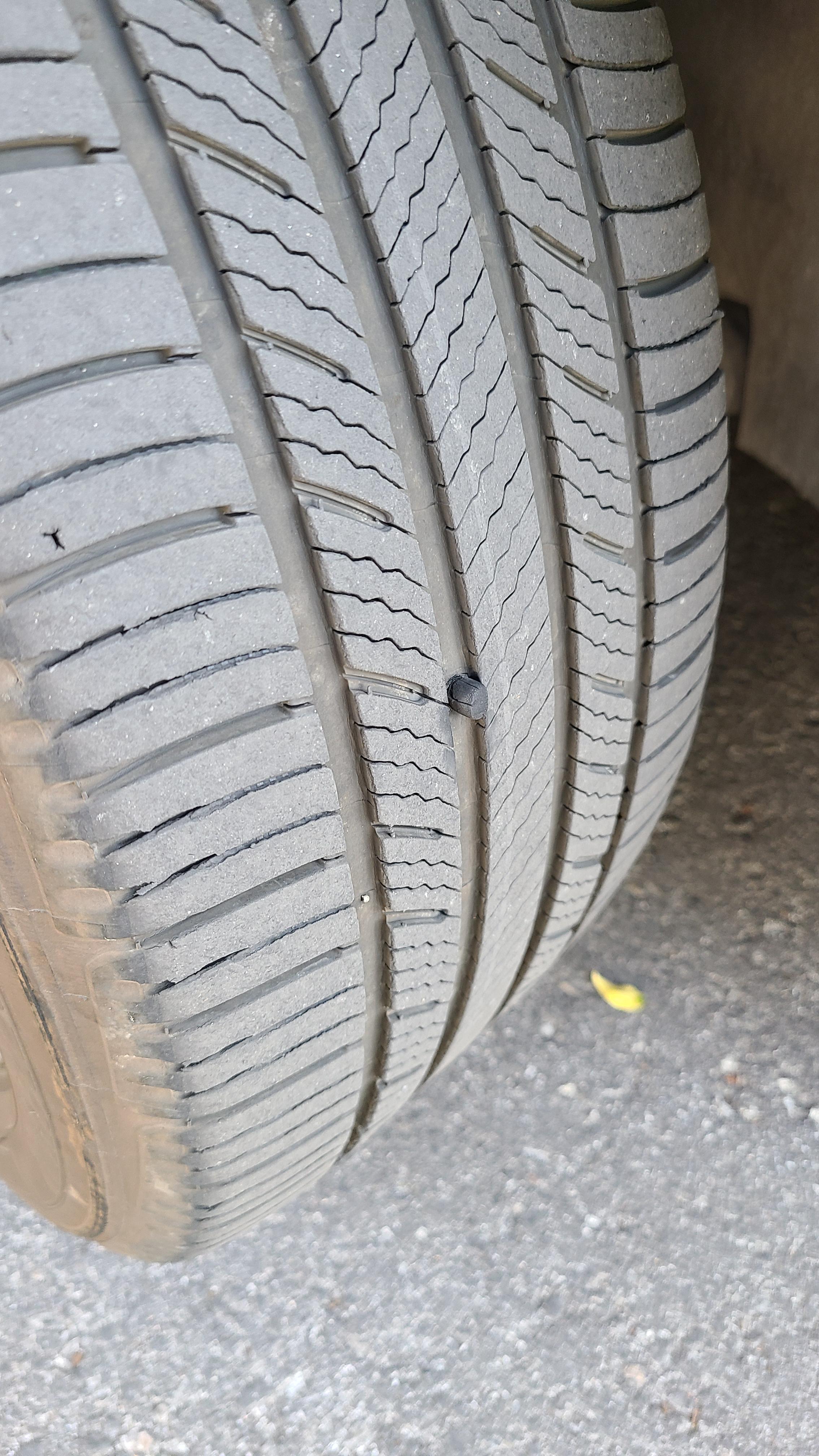 What is this rubber plug on my tire? And should I be worried? r