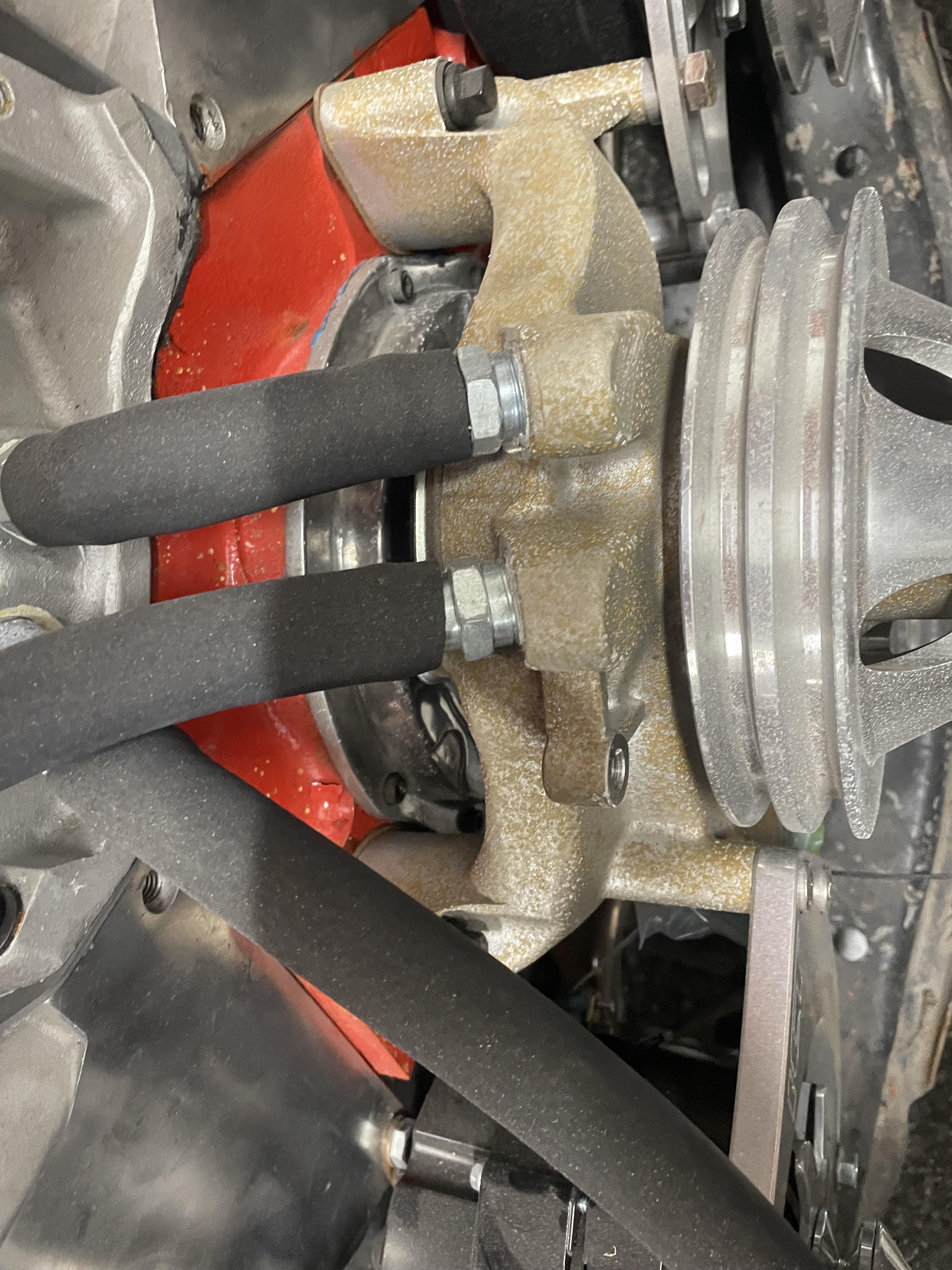 What causes this orange looking oxidation on my aluminum water pump