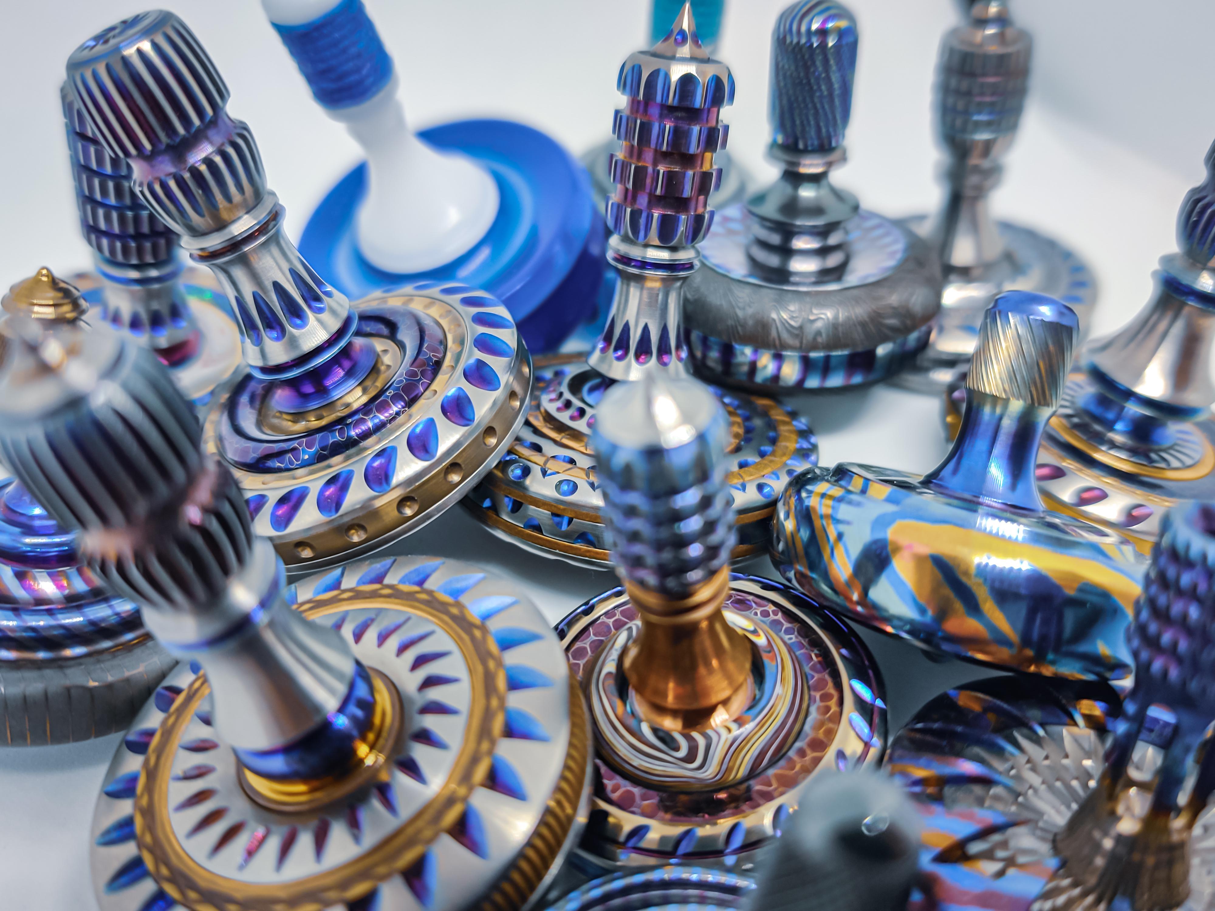 My collection of blue precision spinning tops. r/CoolCollections