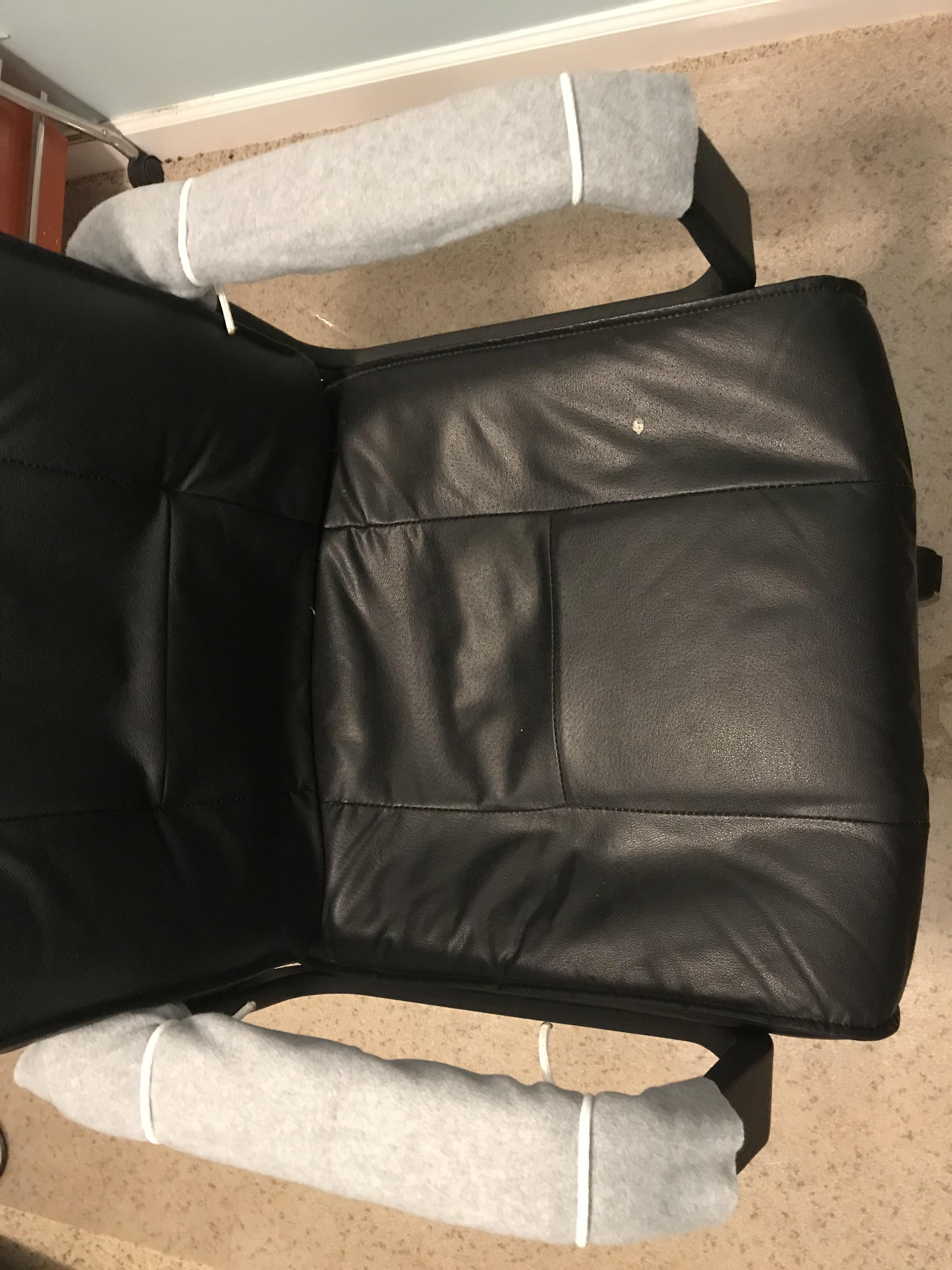 My makeshift cushions for my office chair. My arm rests are pretty hard