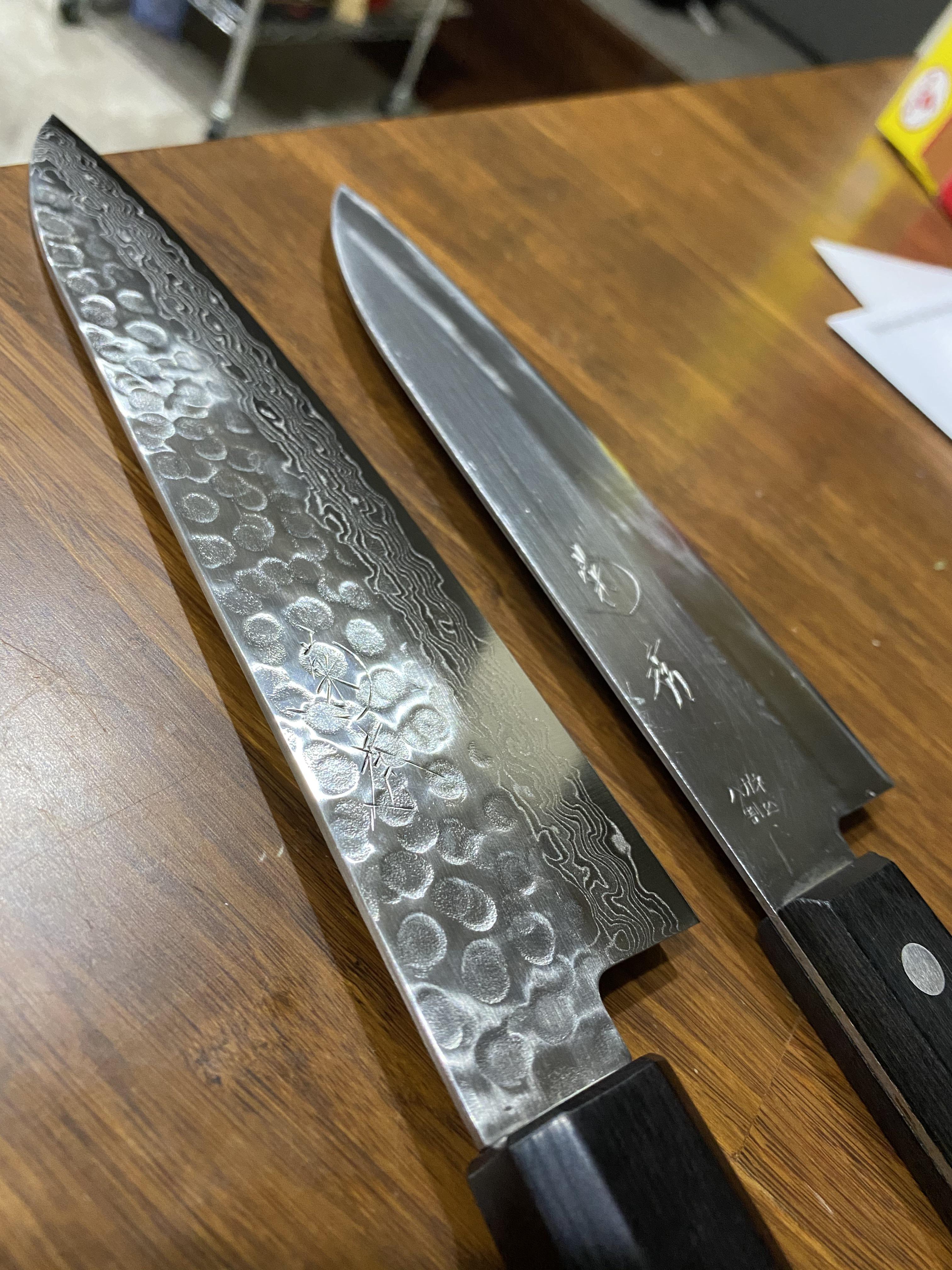 A Gyuto and Santoku knife from the Kikuhide knife store. Got them from