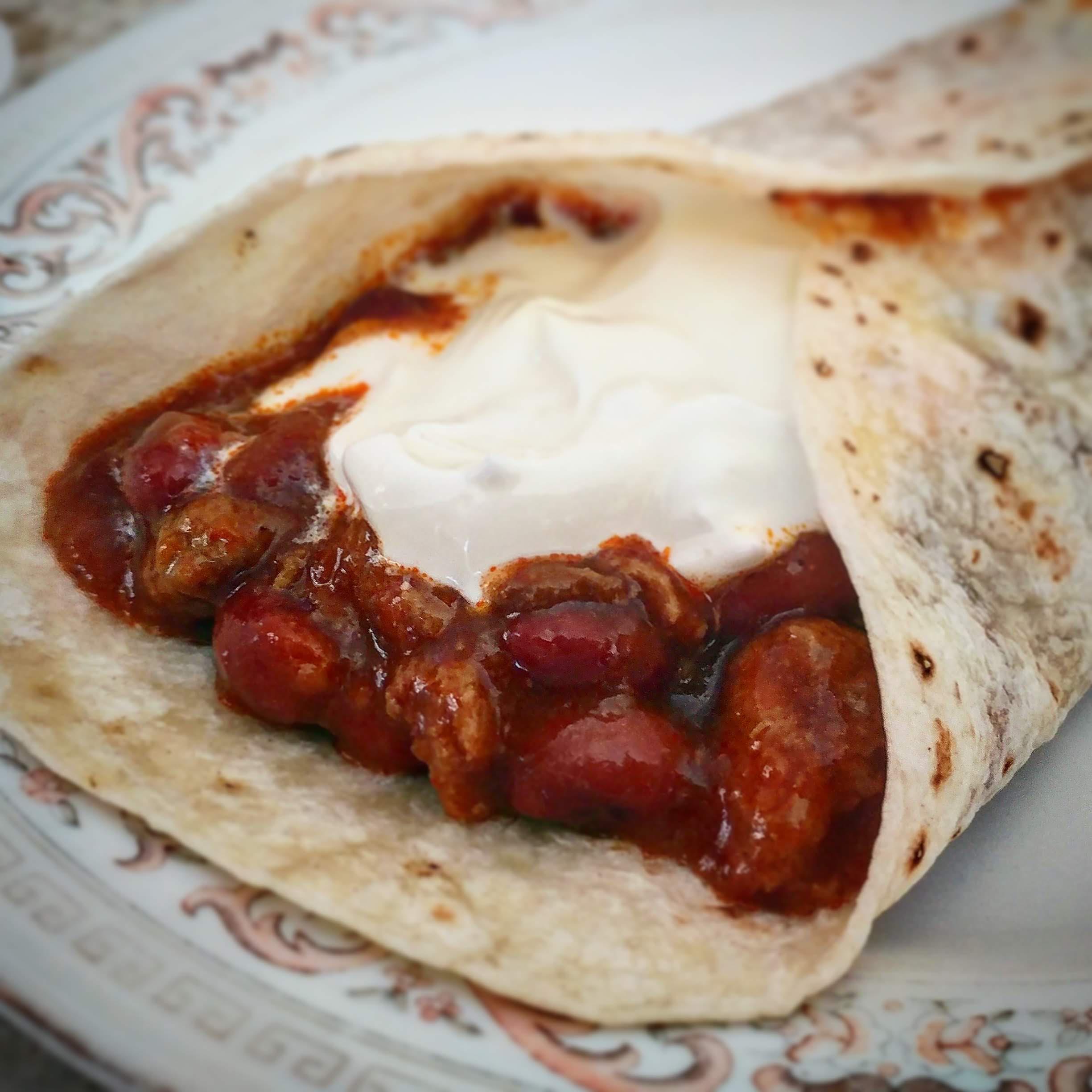 [Homemade] Chili burrito with sour cream r/food