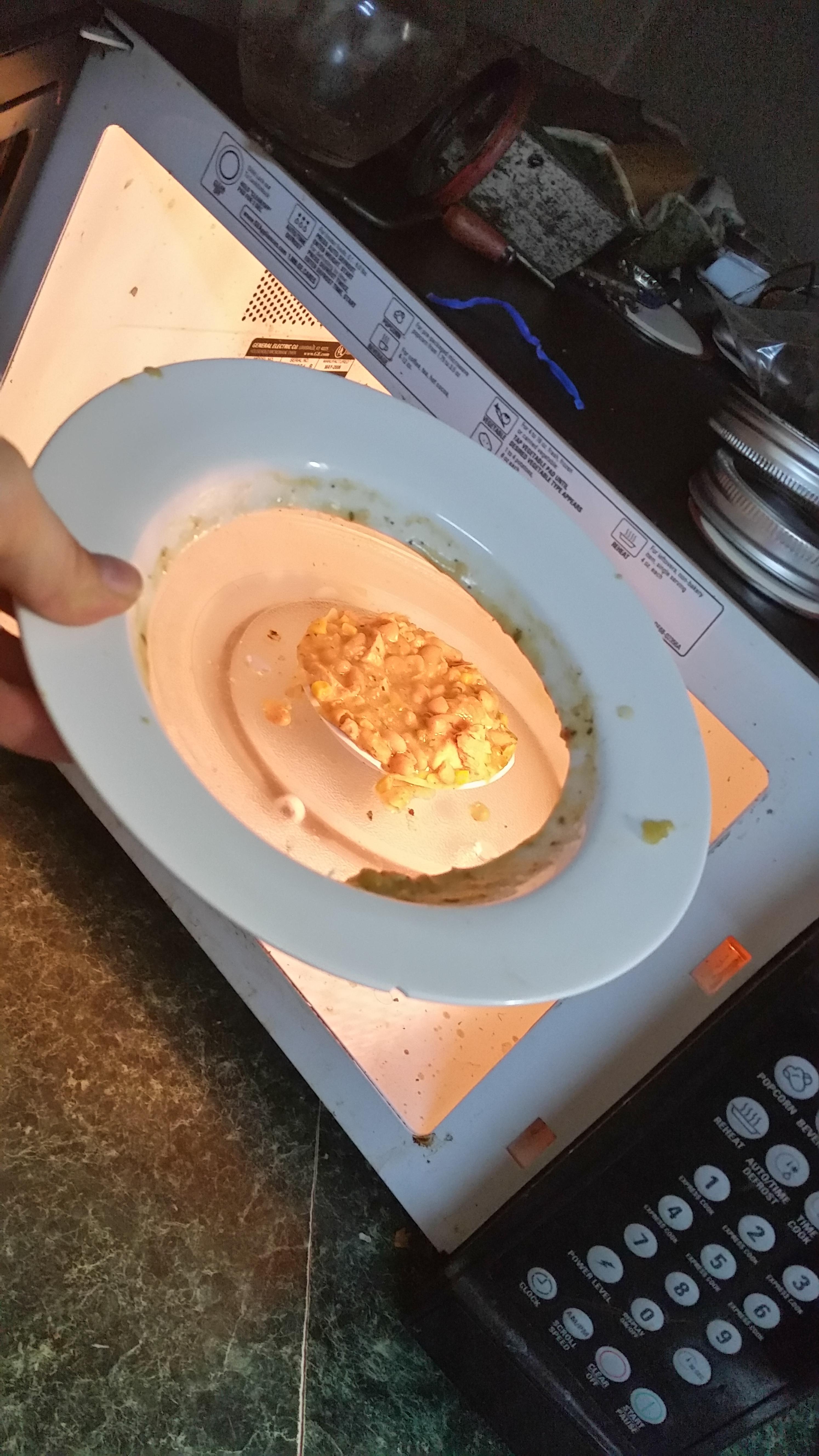 Dinner fresh from the microwave. r/confusing_perspective