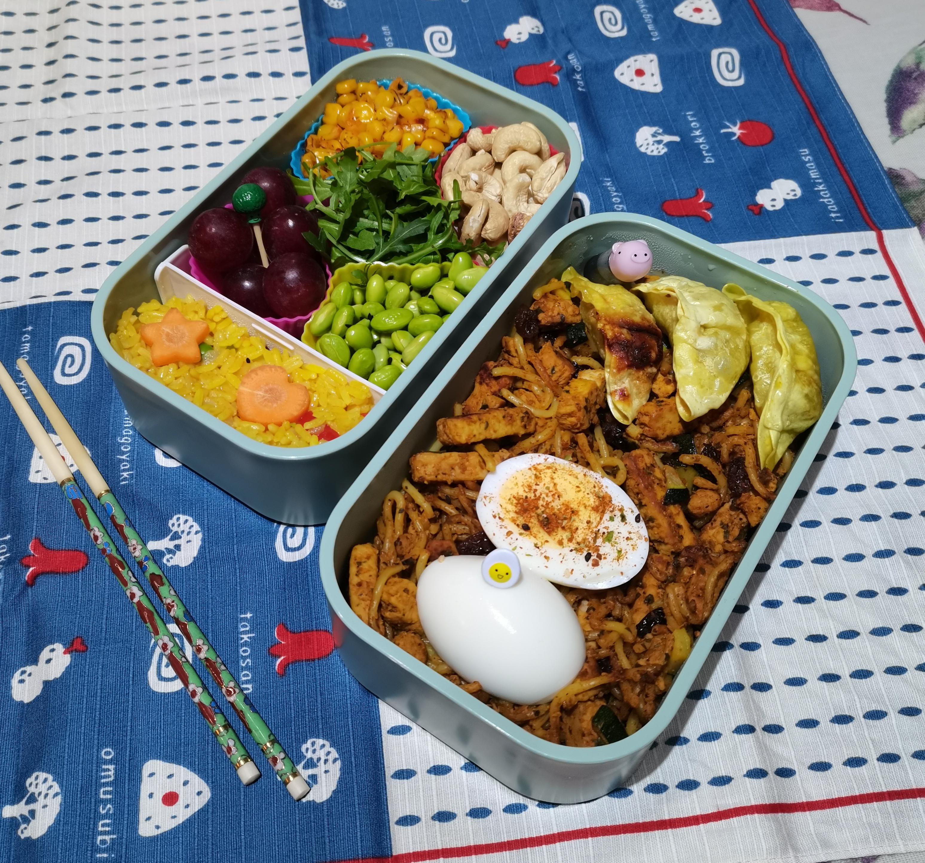 Fajita quorn and courgette noodles with egg and gyoza. Veg paella