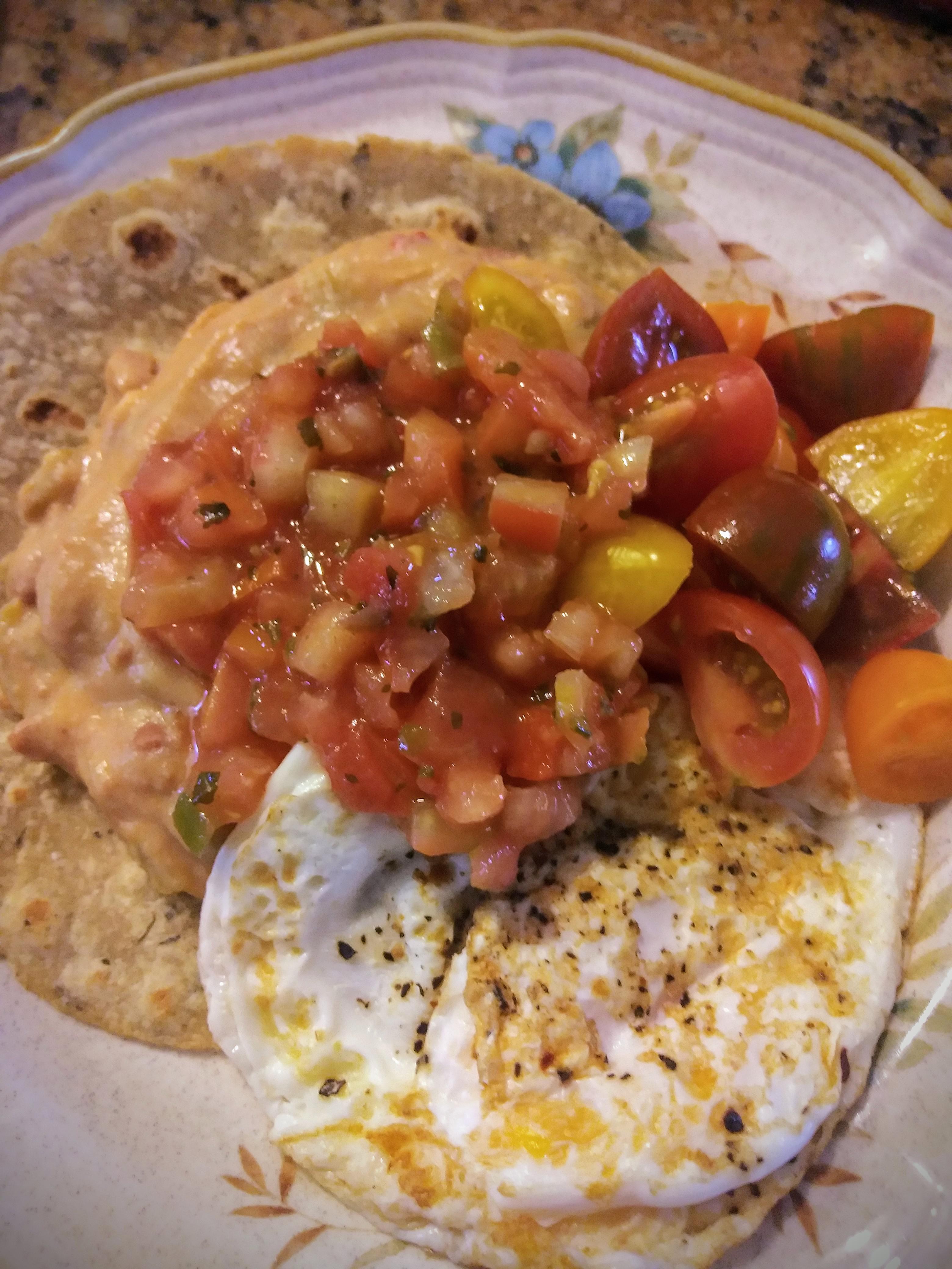 This huevos rancheros was SO delicious (and it only took 15 min to make). Whole grain tortilla