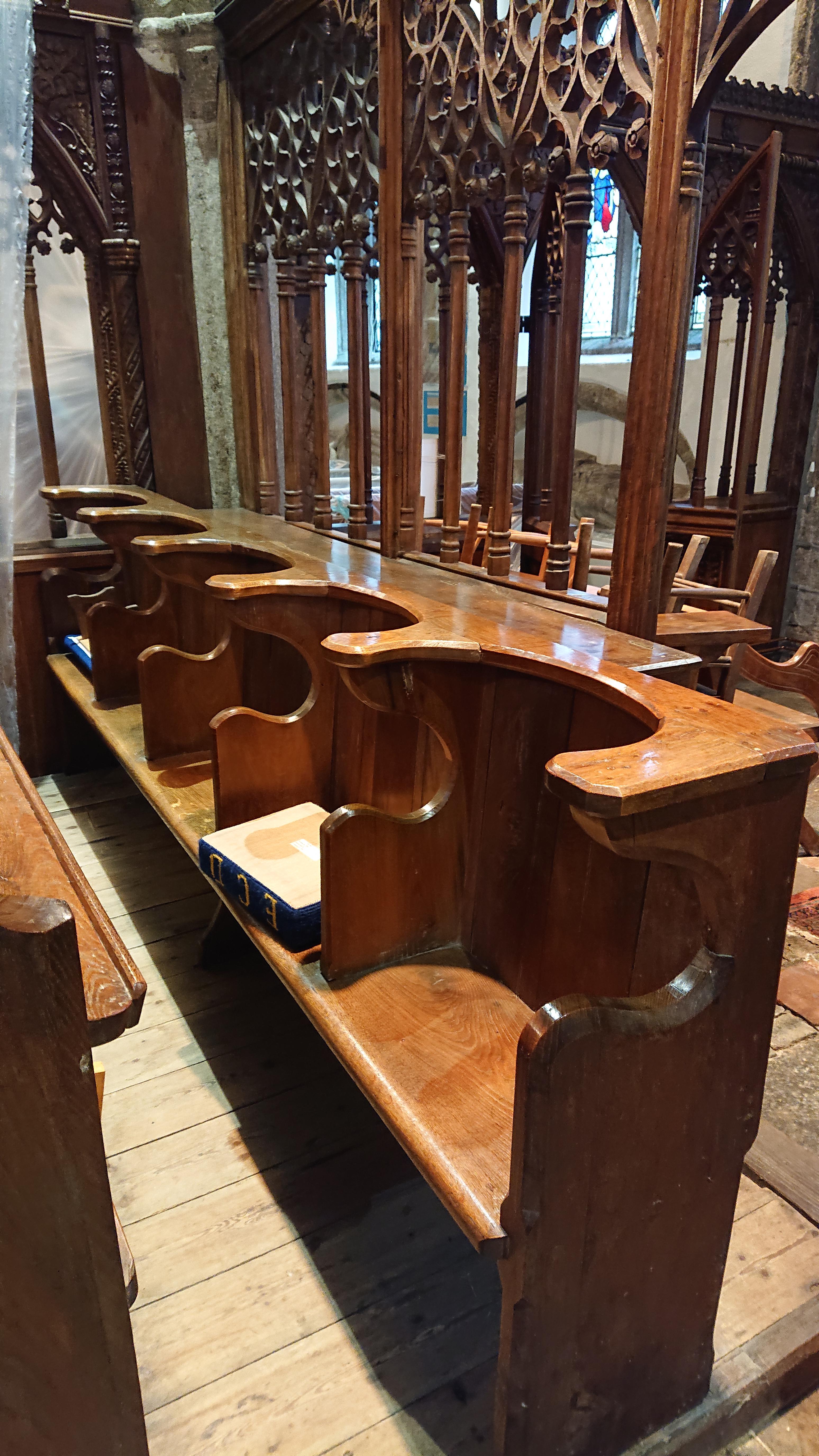 Strange shaped church pews. Found these at the back of a church we are