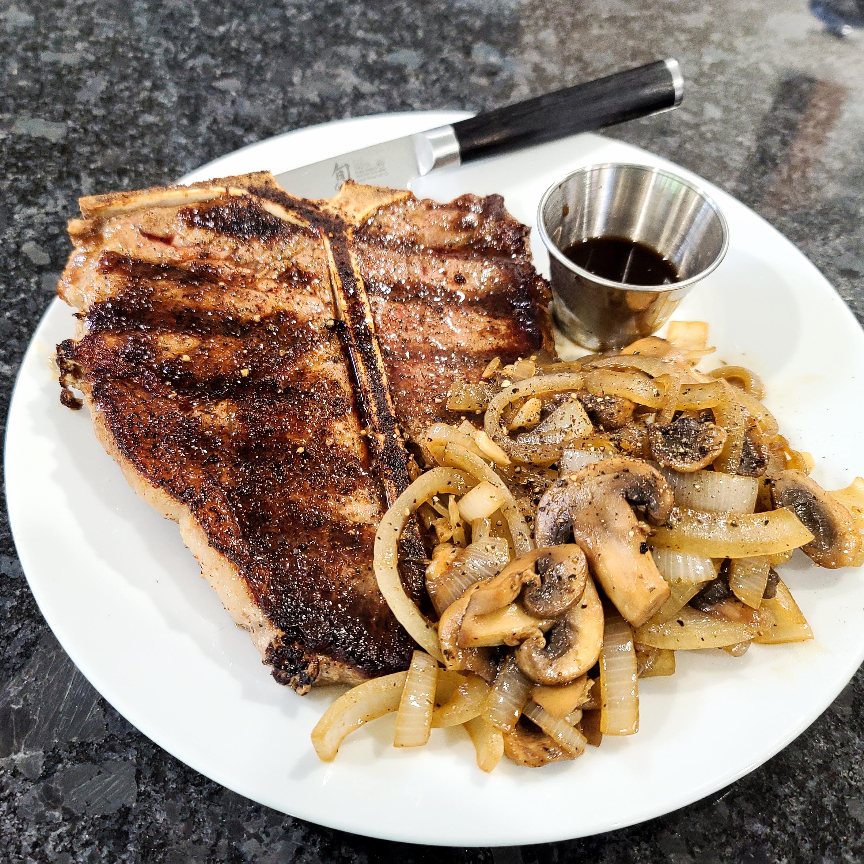 TBone Medium Rare With Grilled Mushrooms And Onions steak