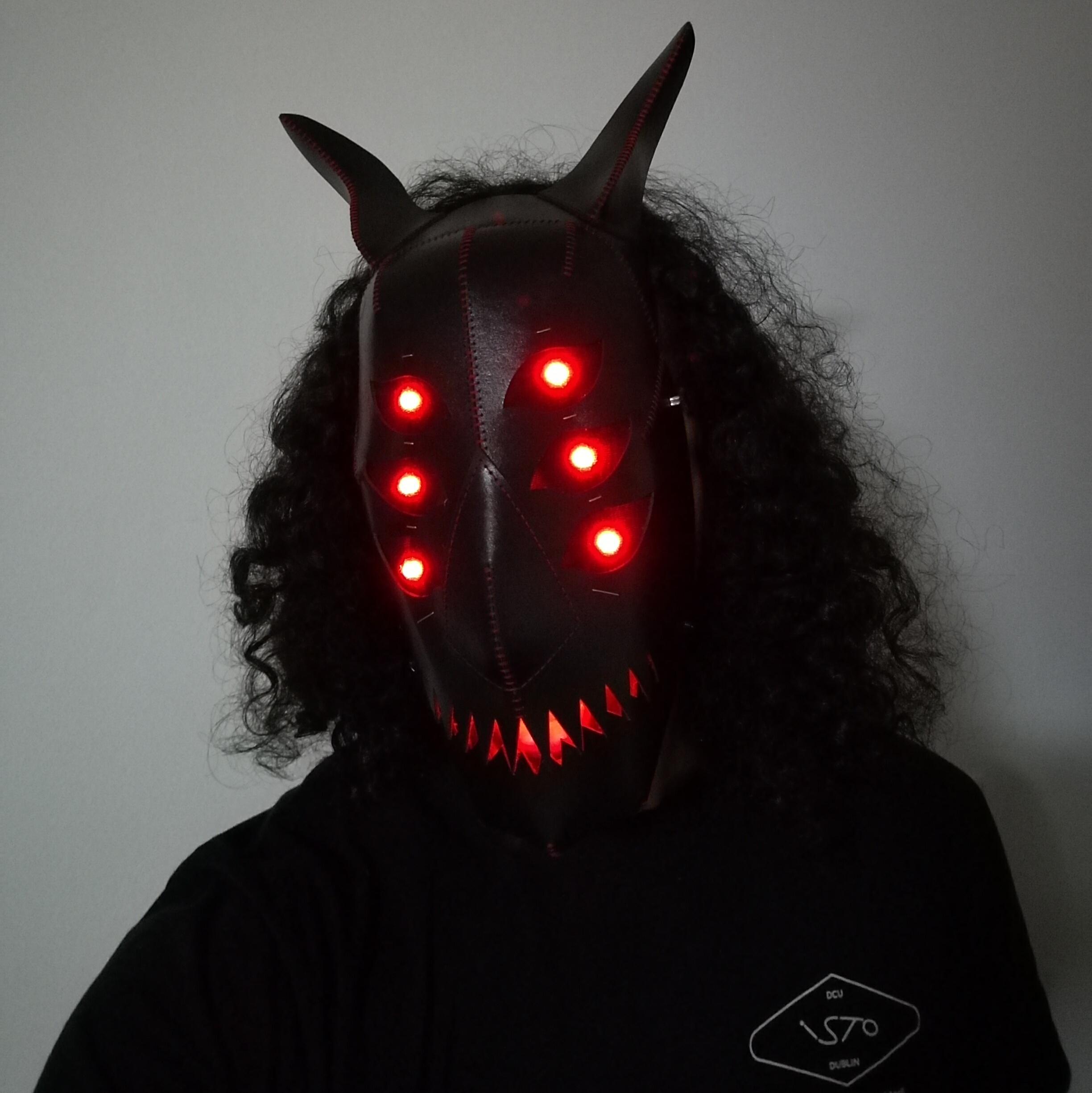 Designed, laser cut and hand stitched a leather mask for Halloween r