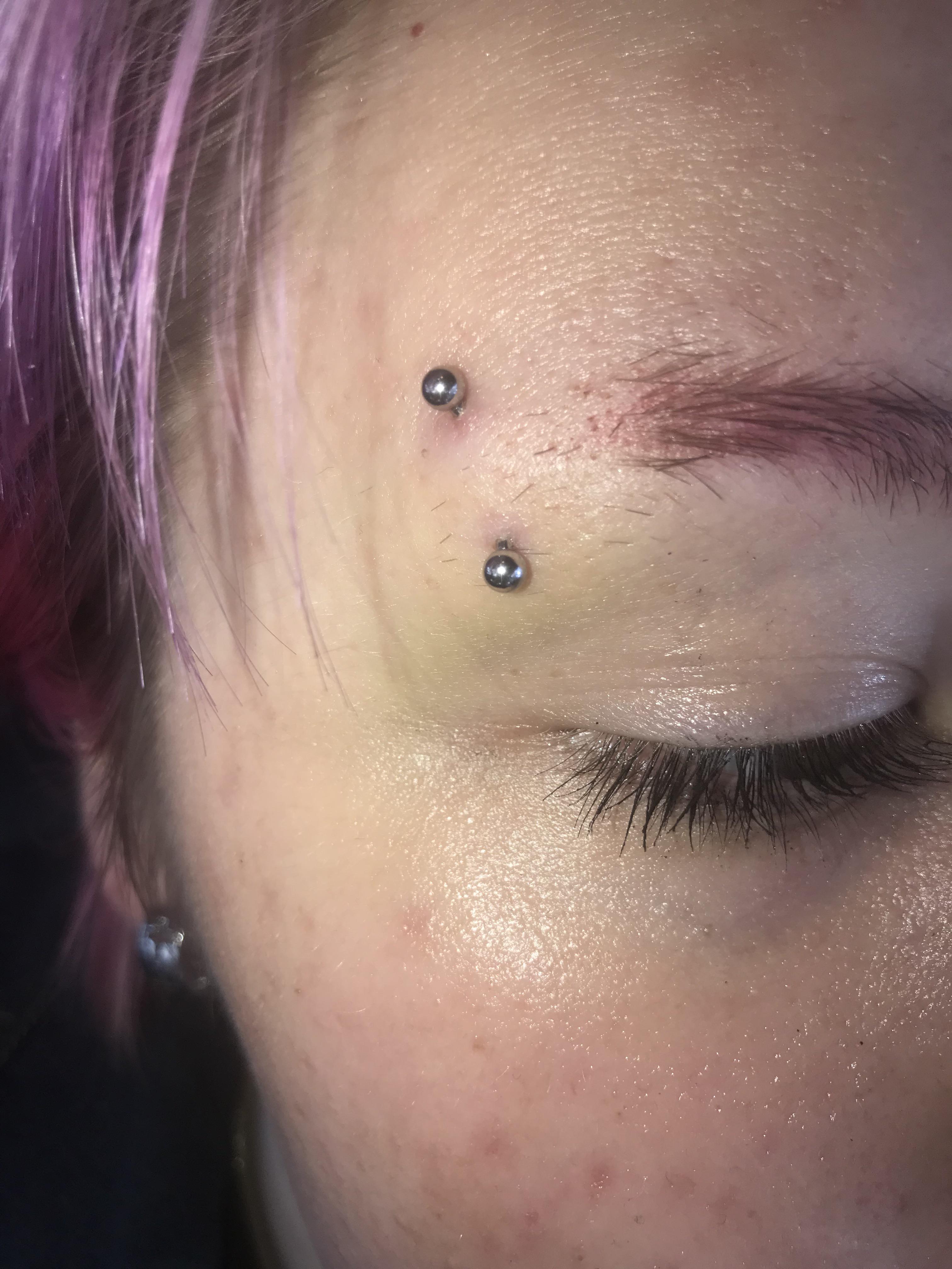Is my eyebrow piercing healing correctly? r/piercing
