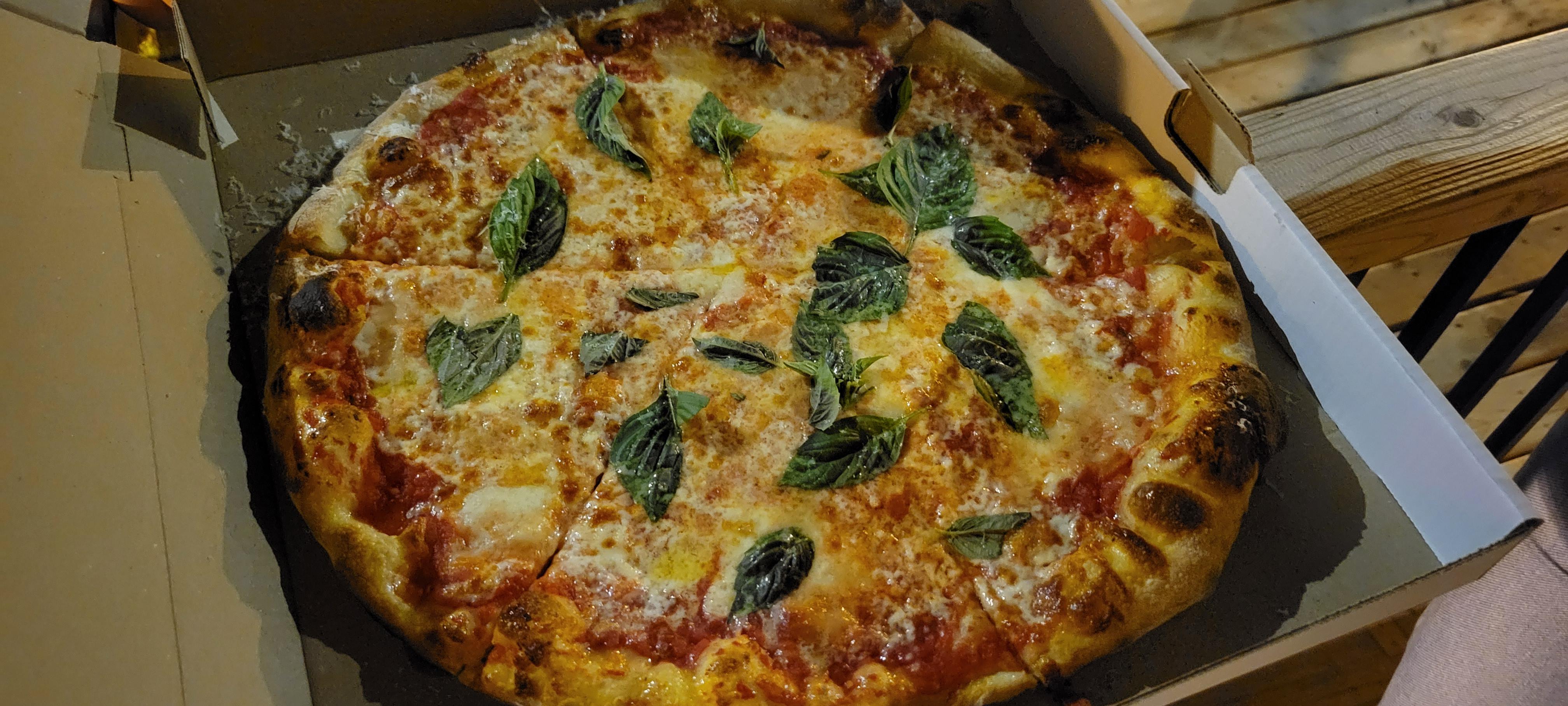 NY style pizza in Montreal Canada Pizza