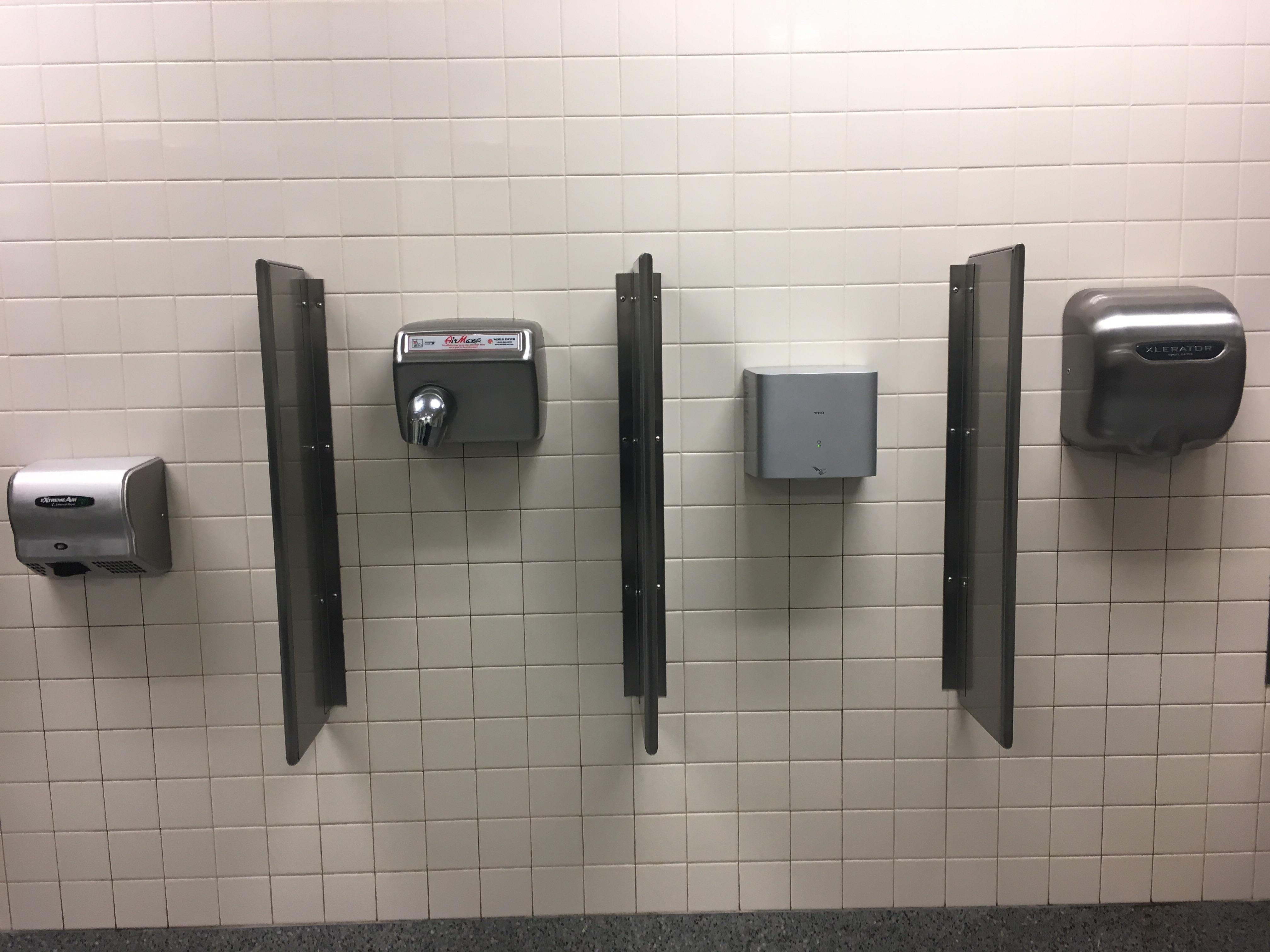 This airport restroom has four different hand dryers. r/mildlyinfuriating