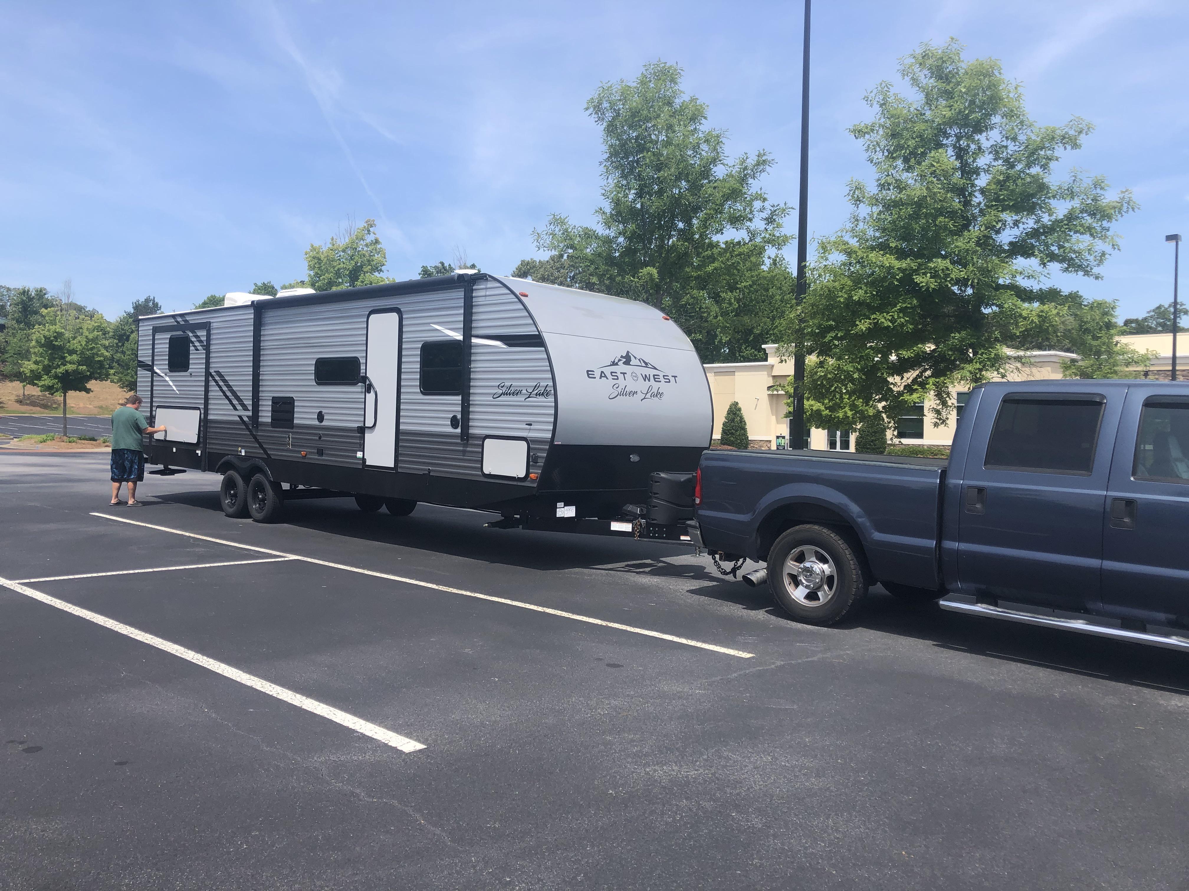 New camper day! We upgraded from an East to West Silver Lake 27K2D to a