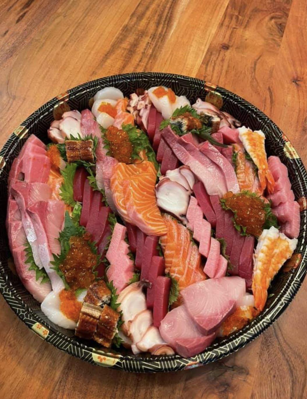 Sashimi platter from Seattle Fish Guys r/sushi