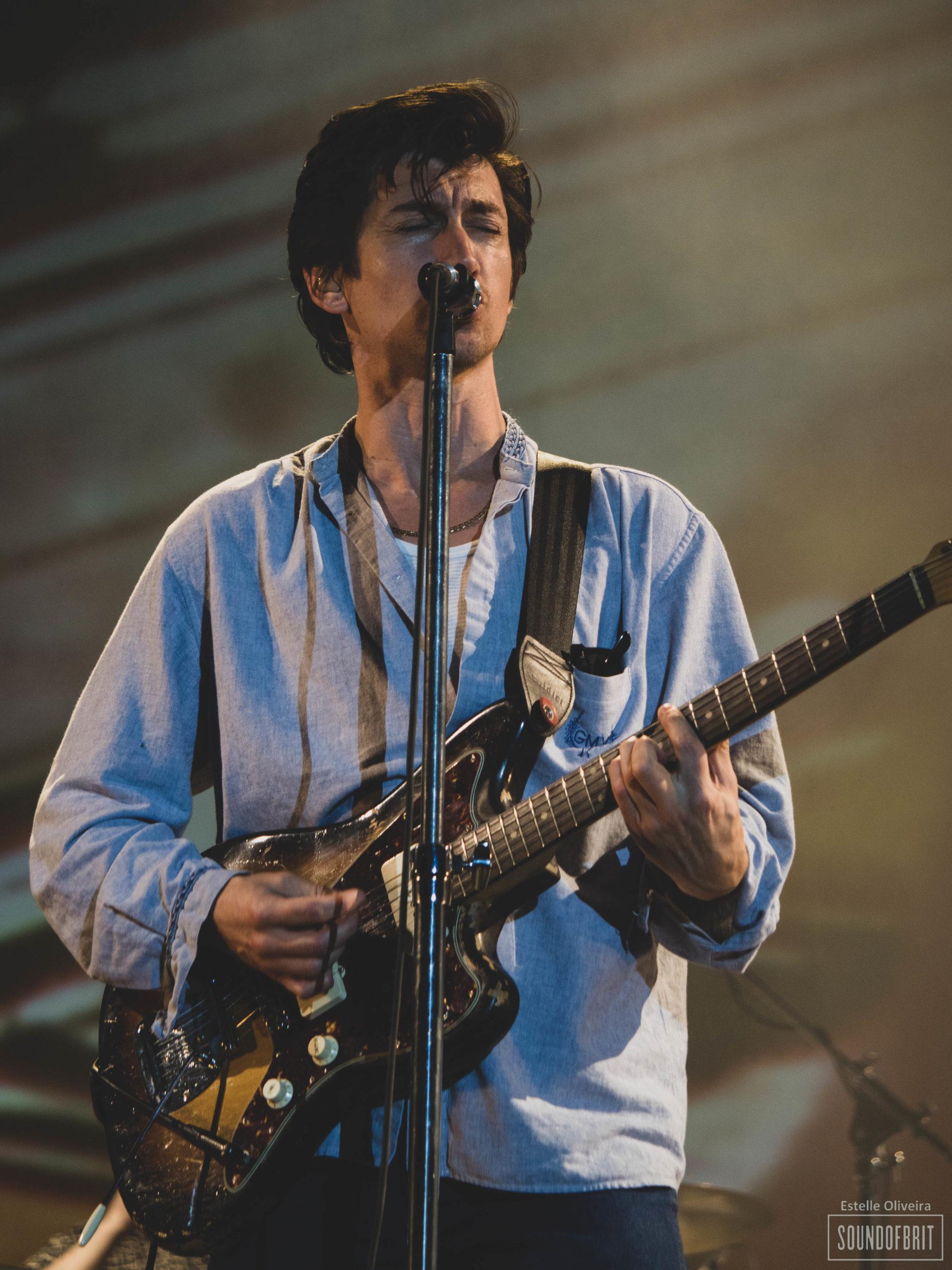 Alex's new guitar strap is a seat belt r/arcticmonkeys