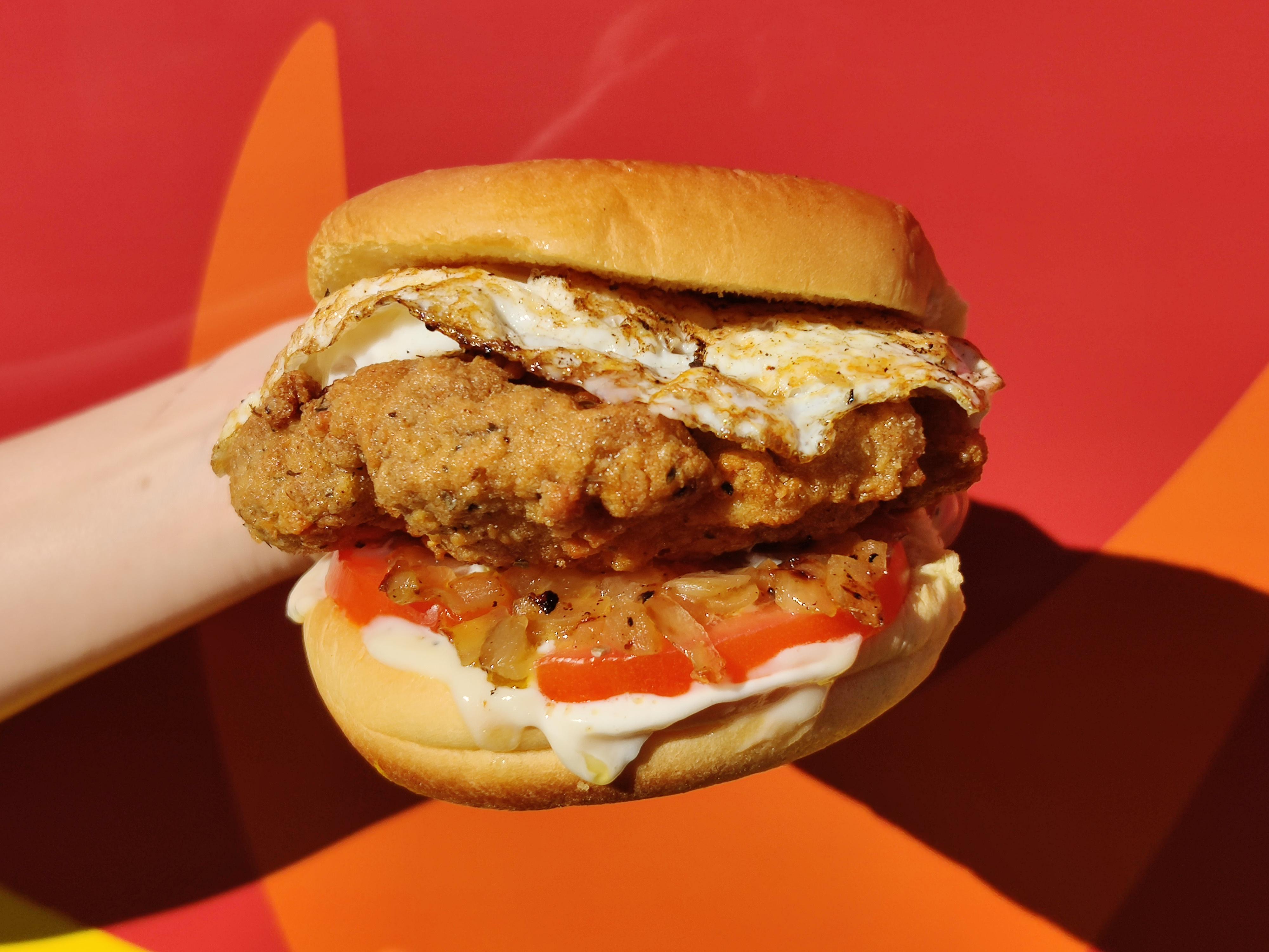 Chicken Fried Hamburger Gravy Mayo, Sauteed Onions, Tomato and a Runny