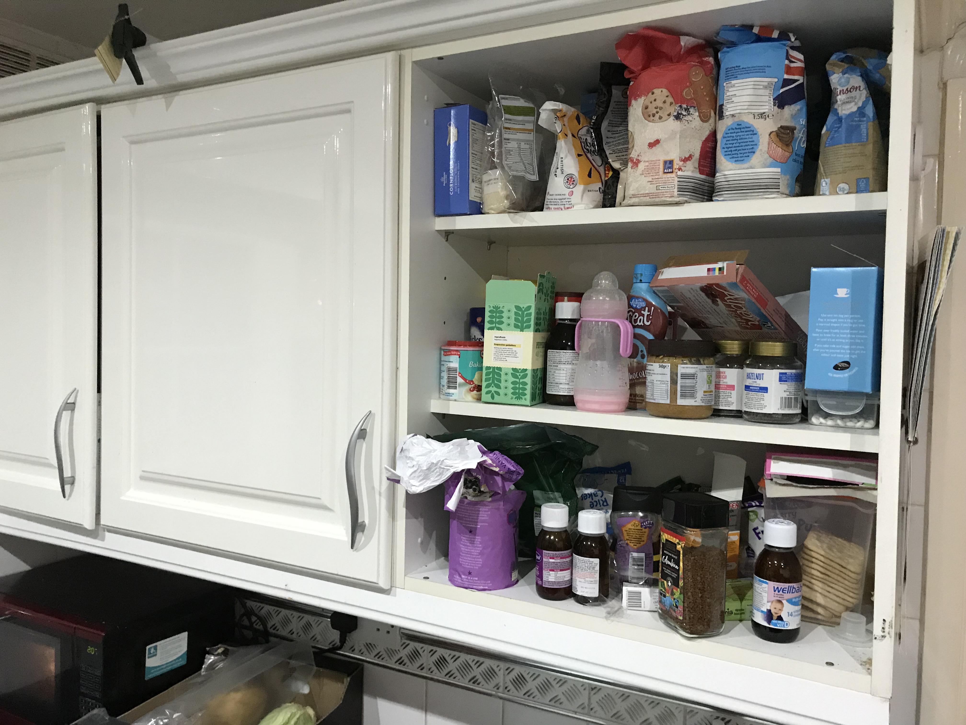 Kitchen cupboard door fell off. Life is better for it. Want some peanut