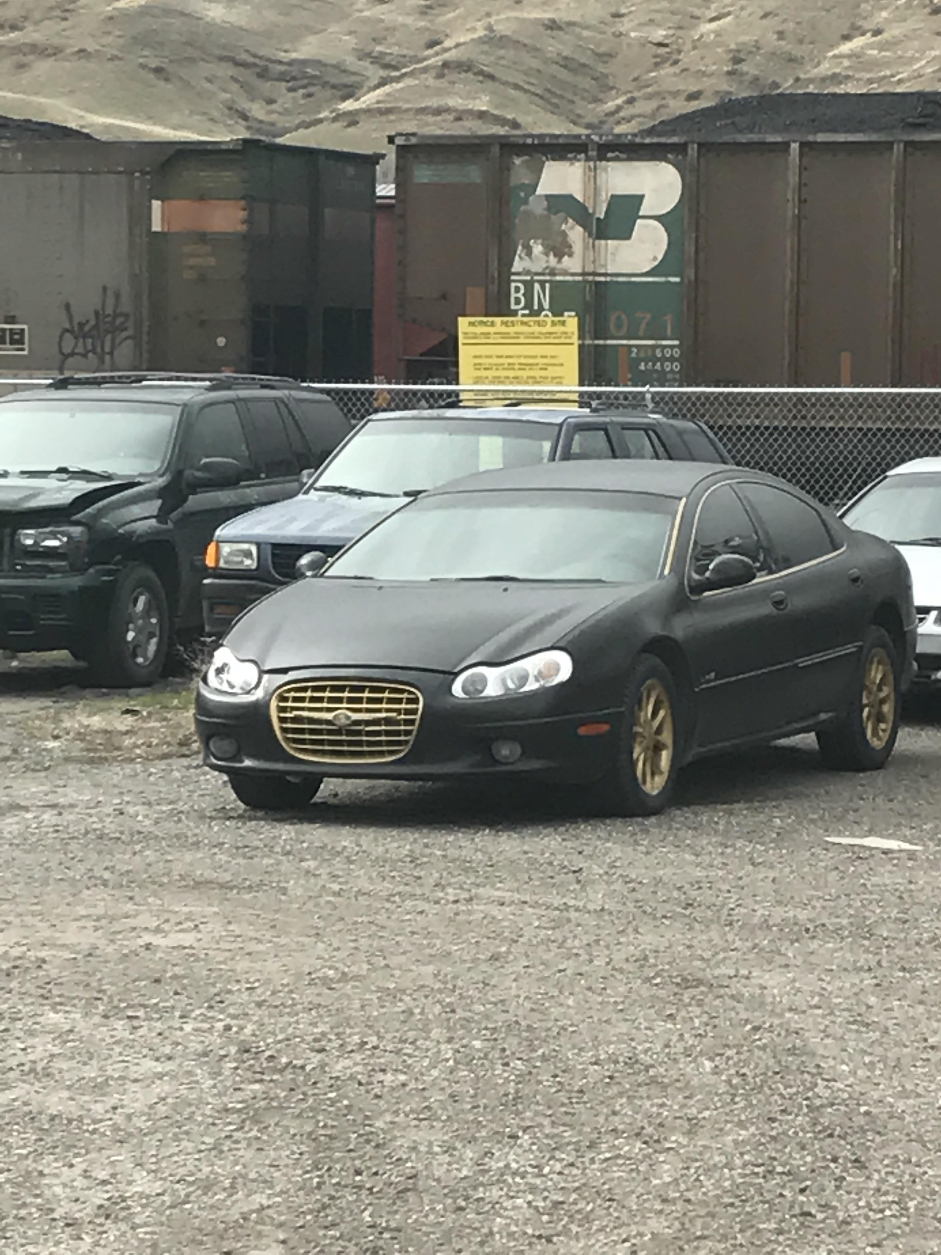 This gold trimmed Chrysler 200 Shitty_Car_Mods