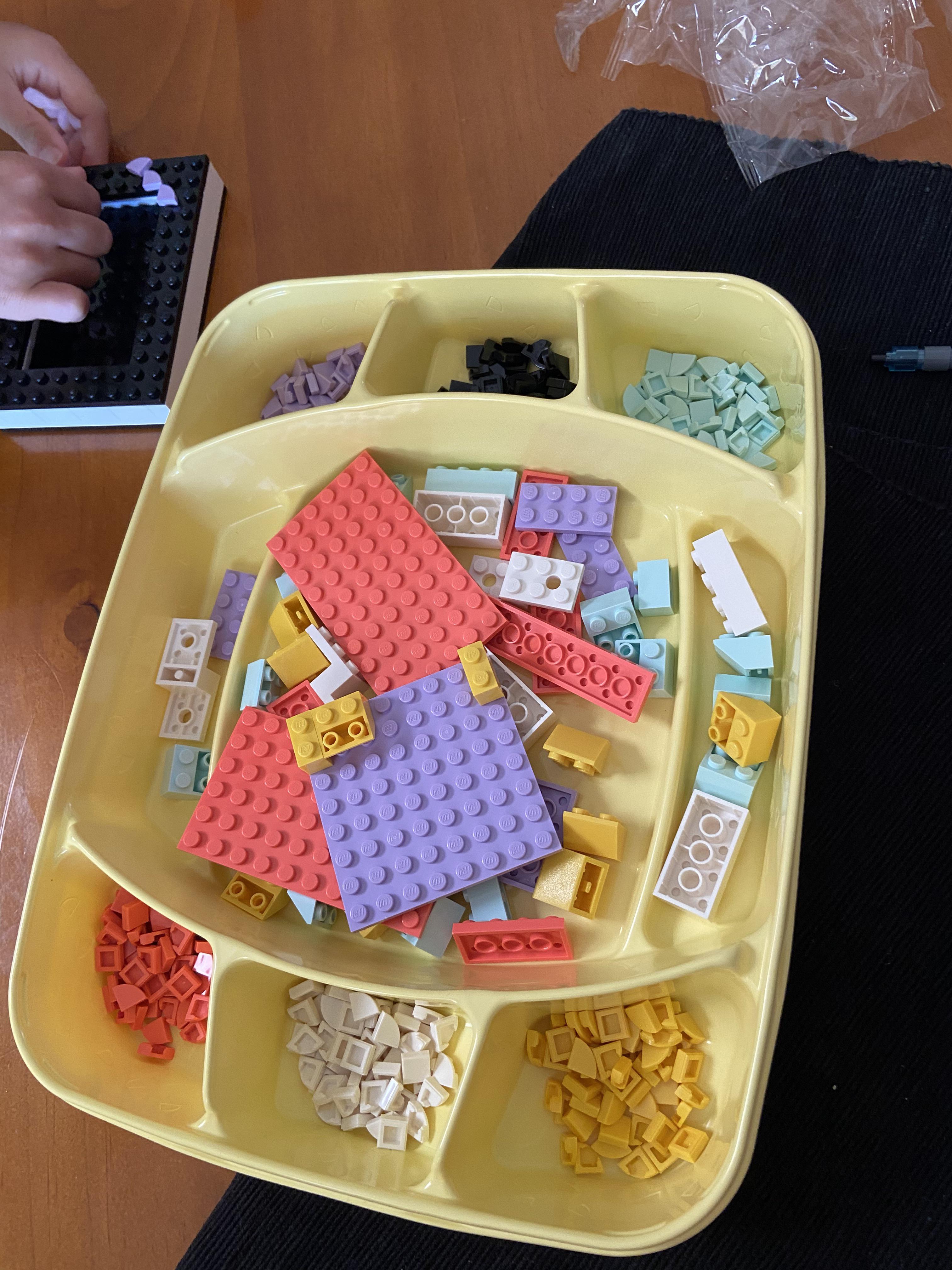 Doing the LEGO Dots Frame with my daughter, the container it comes with
