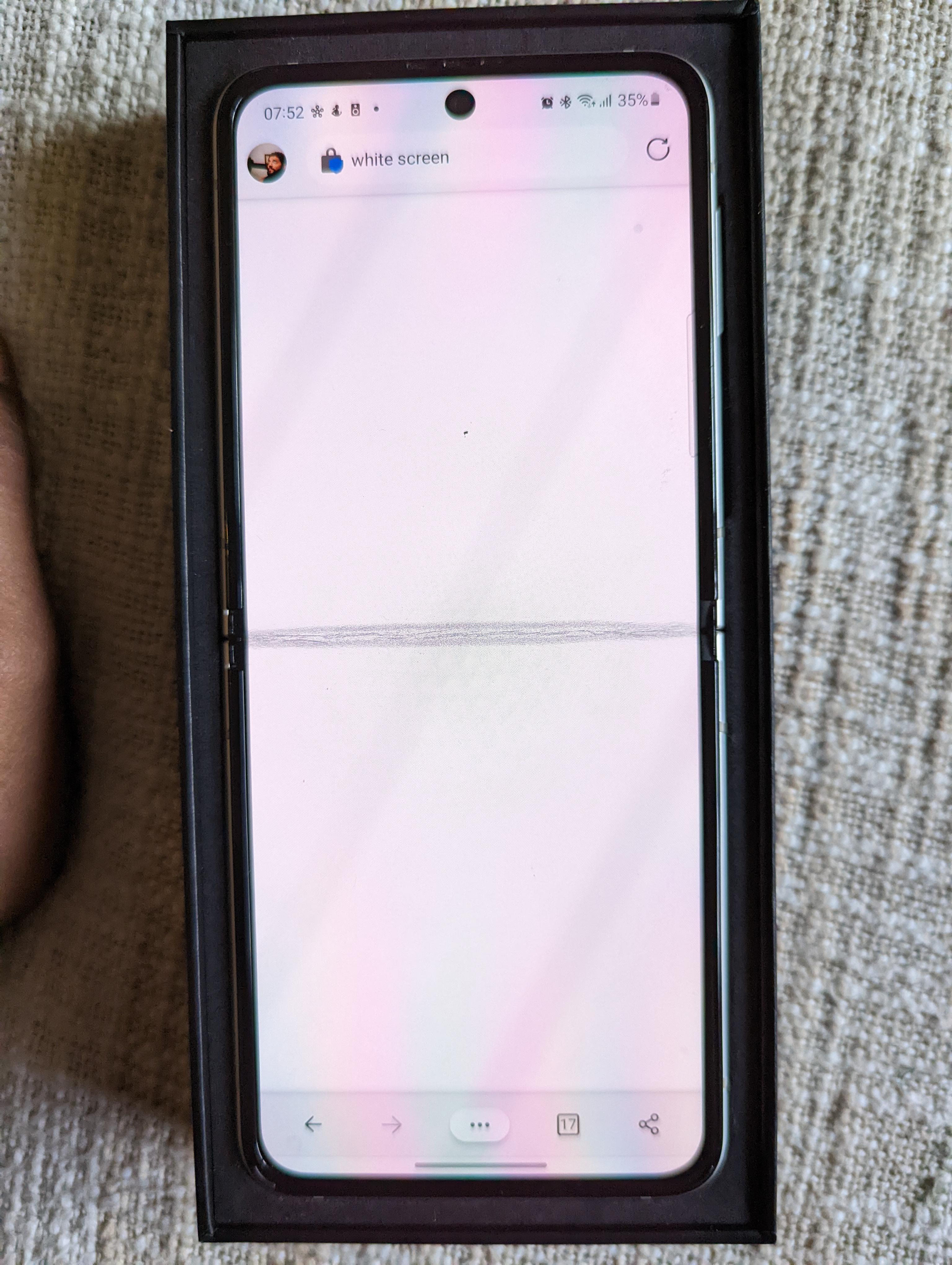 Pic of my Z Flip 3, which formed a crease, and for which I was denied