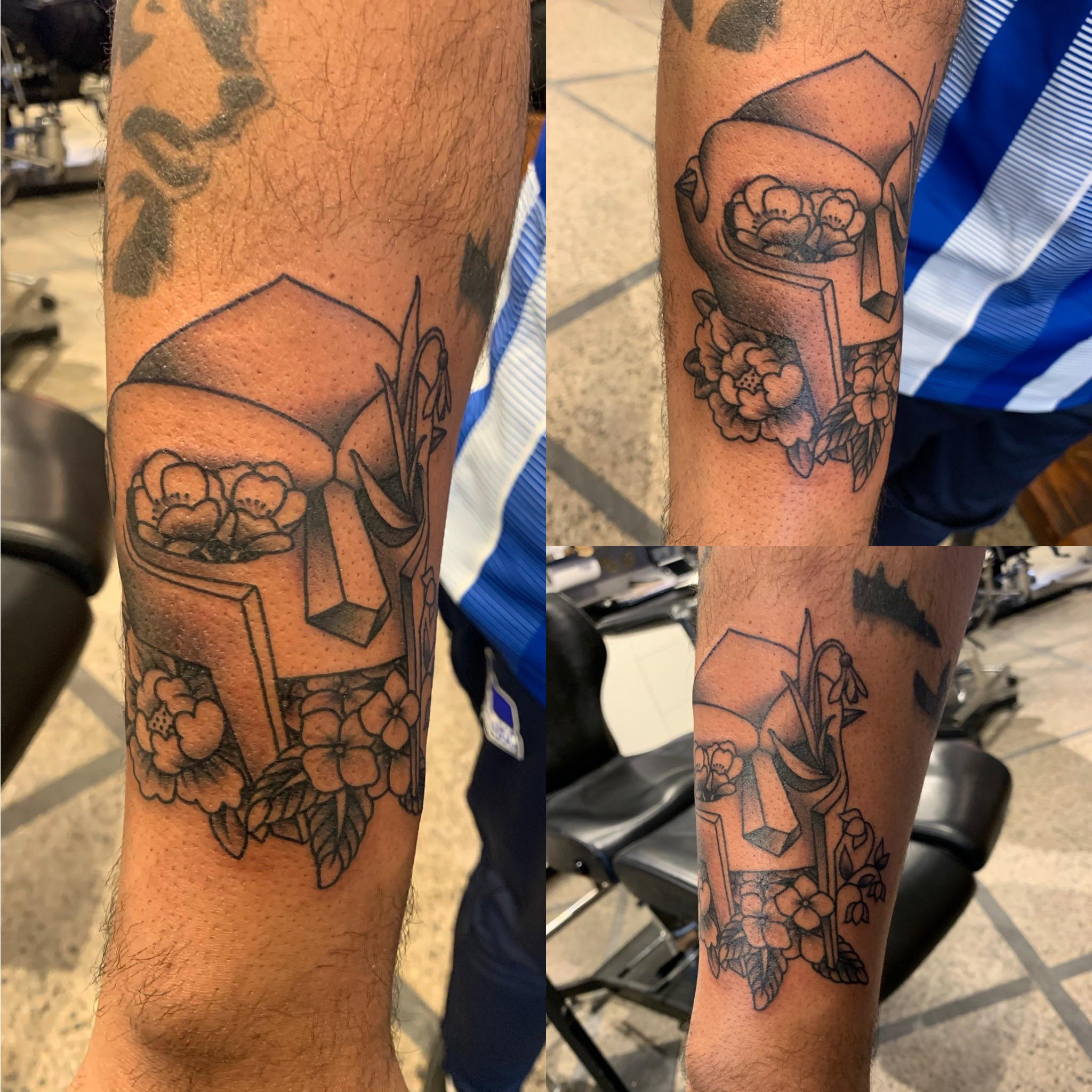 MF DOOM mask with flowers by Ashli Rabbit Powers at Brass Knuckle