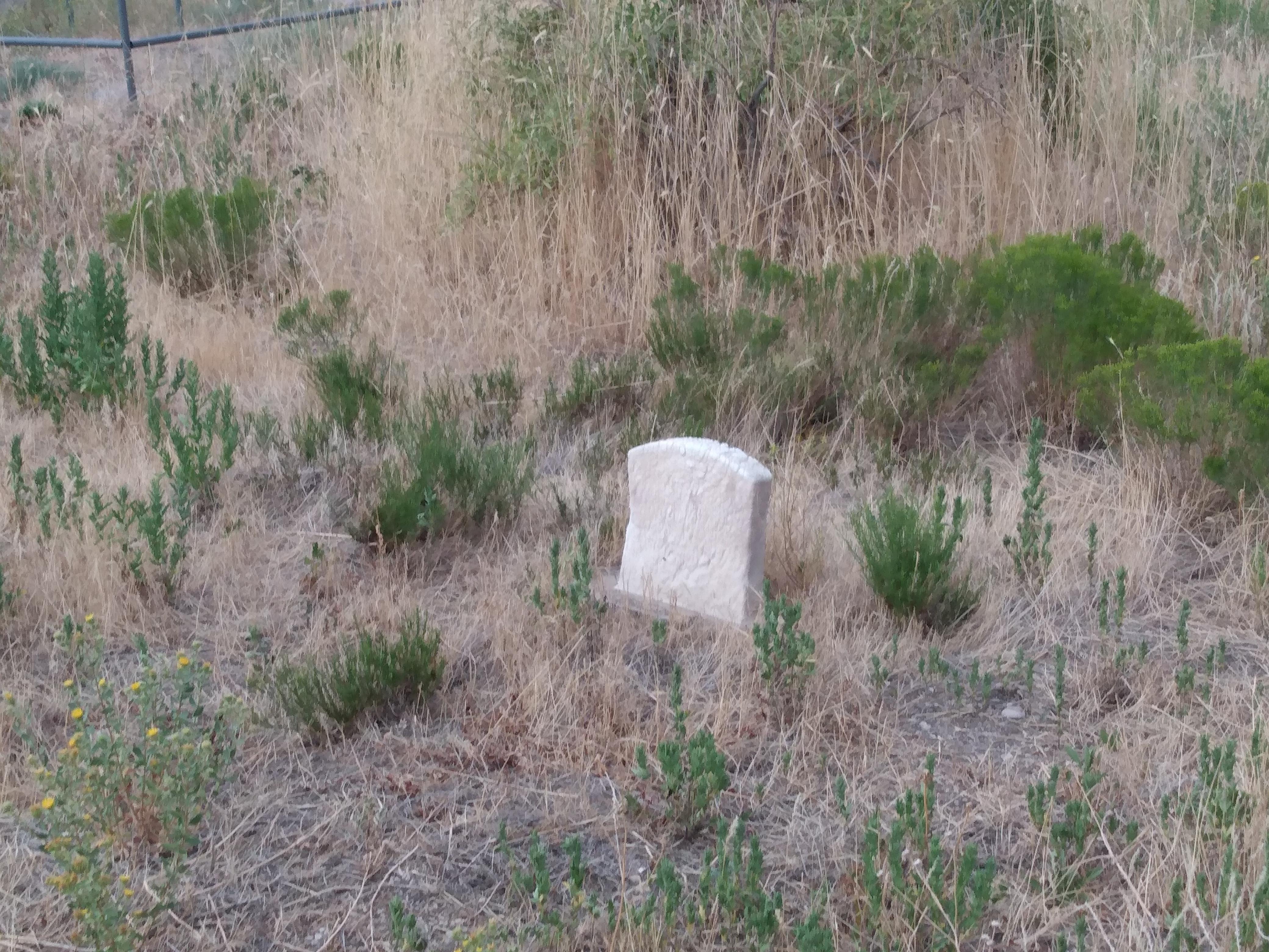 Extremely old and weathered tombstone at cemetery in Magna utah r/pics
