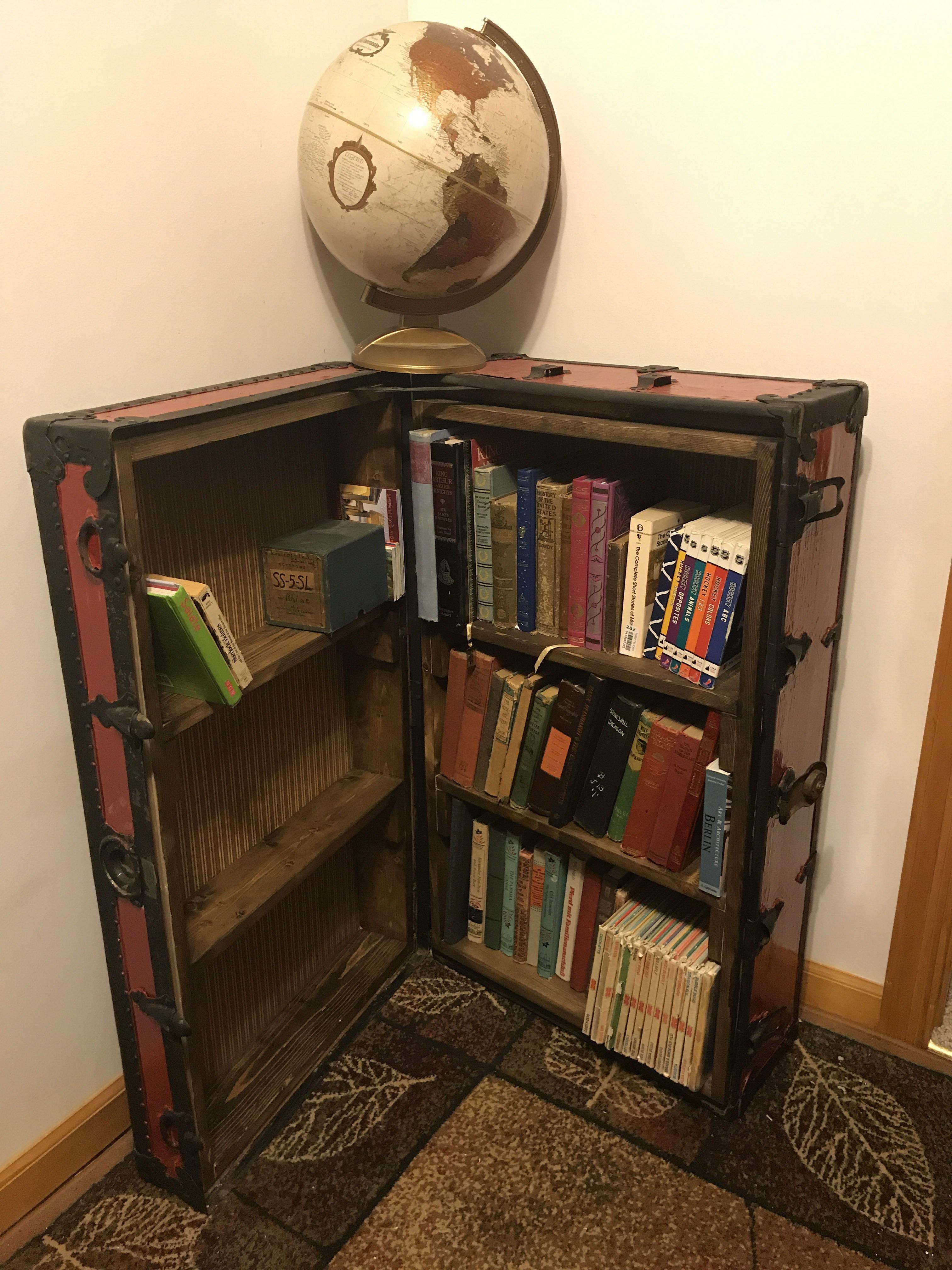 Book shelf I made from an old trunk. r/somethingimade