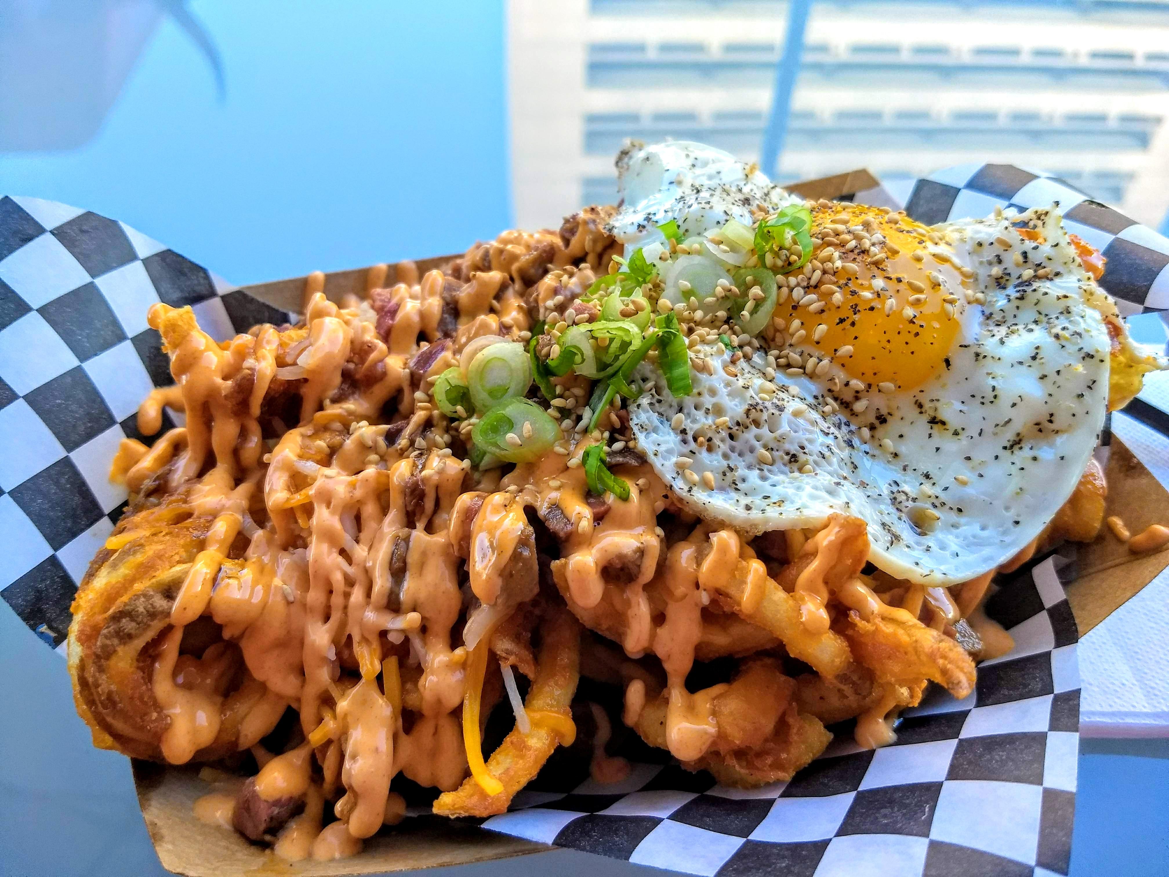 Chopped Brisket Curly Fries with Fried Egg r/FoodPorn